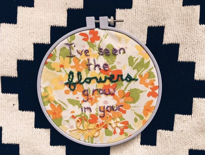 "i've seen the flowers grow in your light" - embroidery thread on vintage bed sheet, lyrics from RVIVR