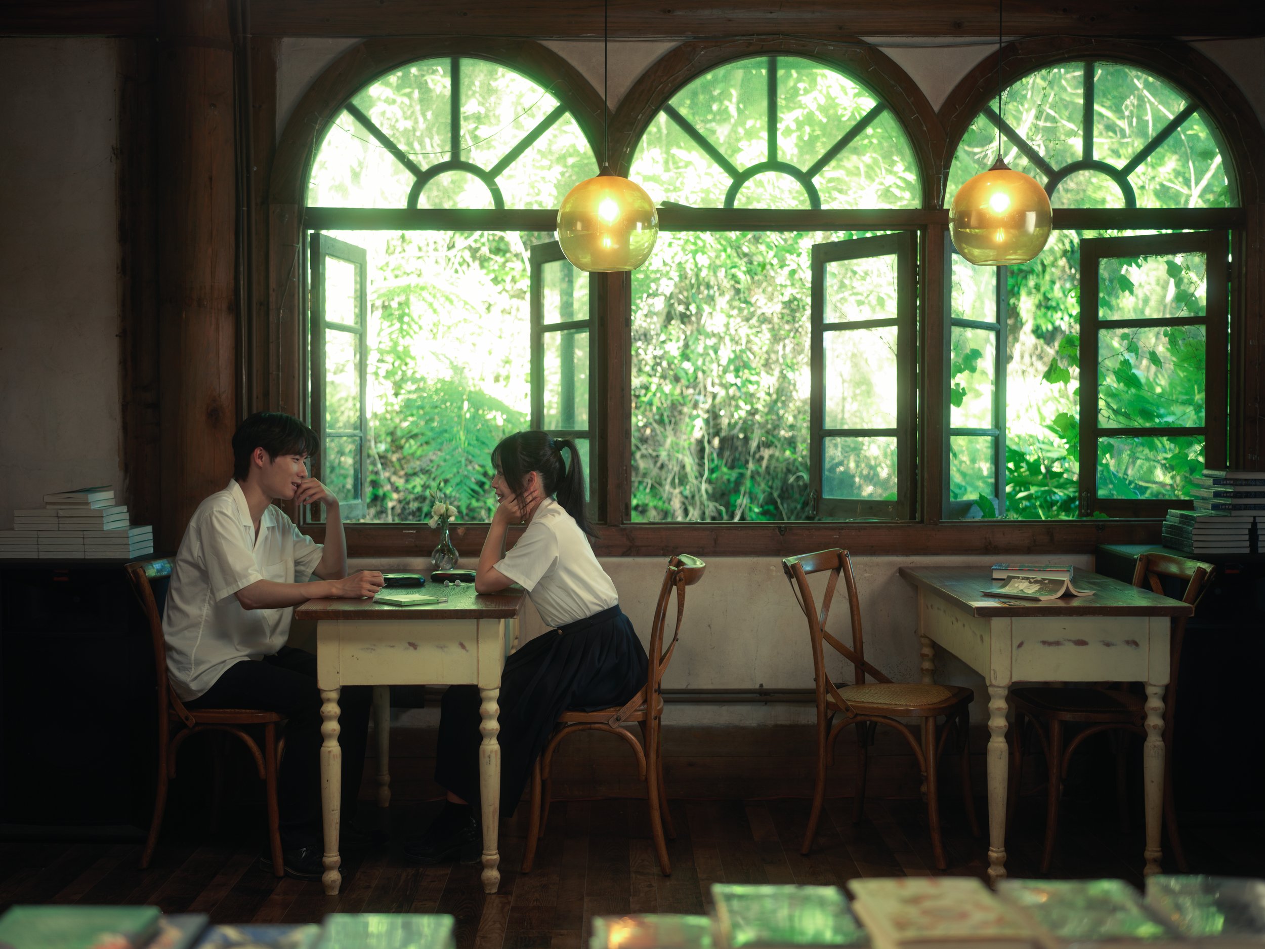 First Date at the Coffee House(Image 6): It was Zhaoqi and Jiaxin's first date. They went to a classic coffee house in town, a place with a charming, timeworn atmosphere. Now, they are both fans of Stefanie Sun's music.