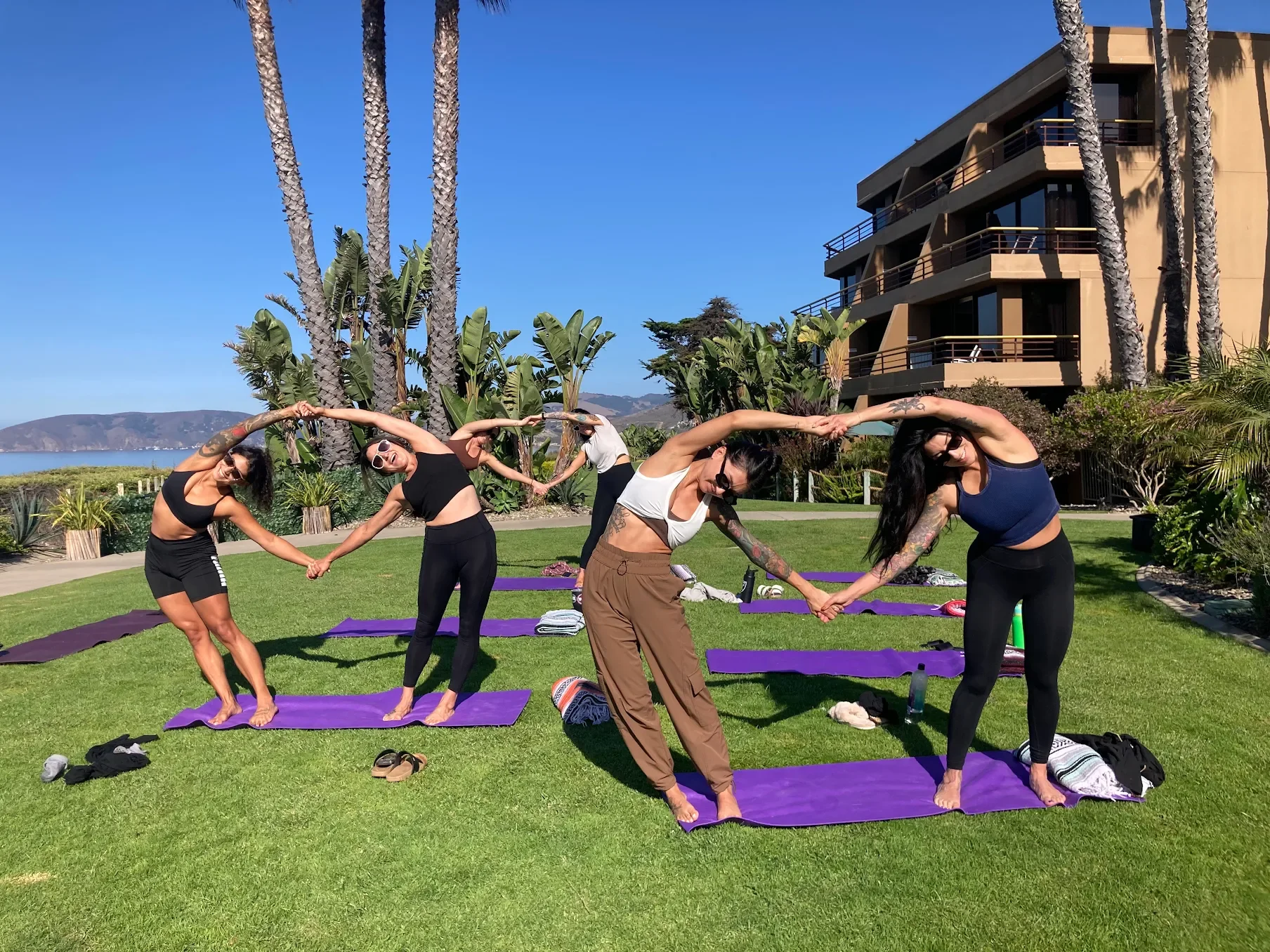 Guests enjoying a private yoga event at Empower Yoga, celebrating together in a mindful and joyful environment. Book your private event today and create your own special gathering.