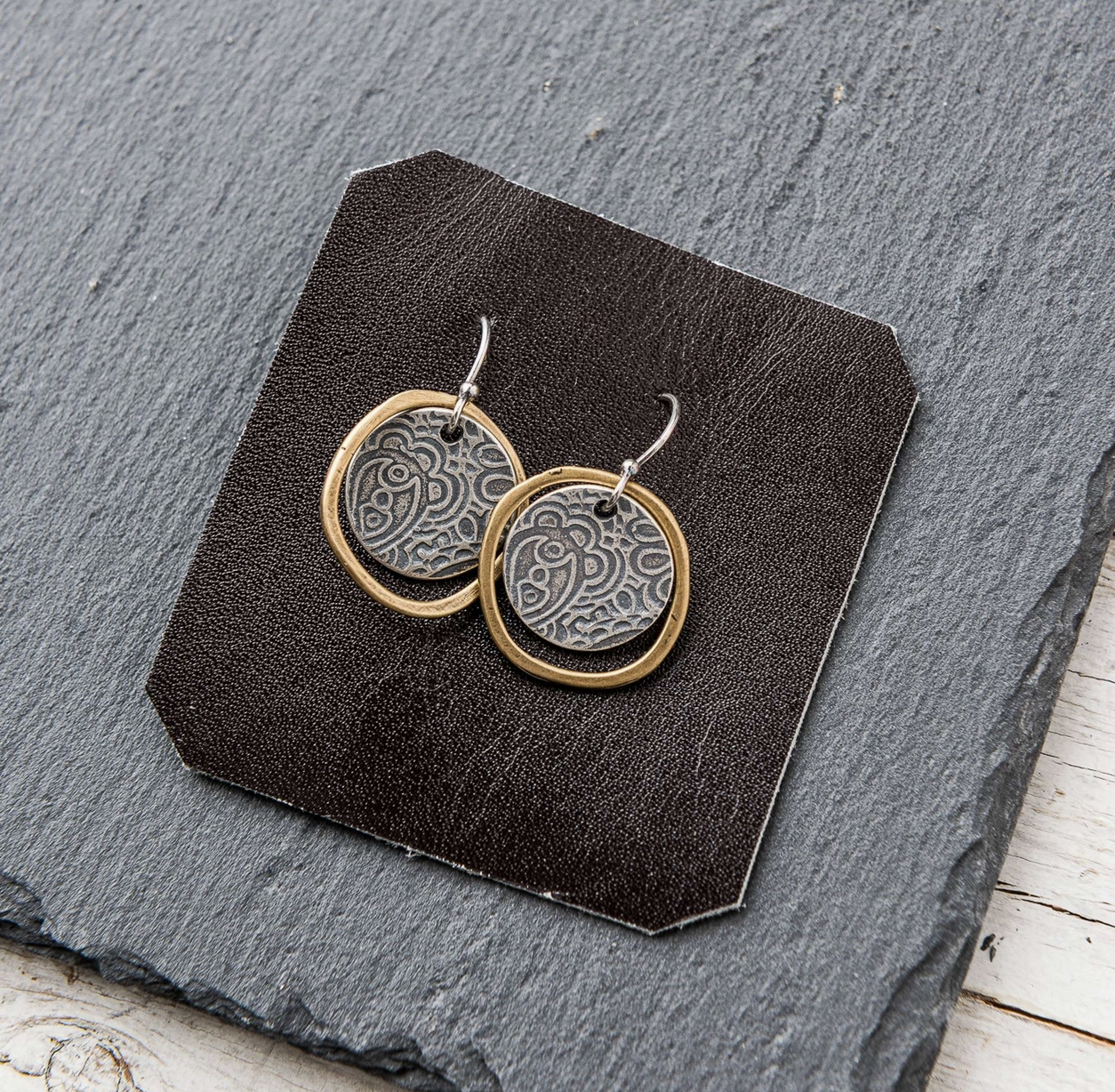 Silver Rustic Paisley Earrings Bronze Frames.png
