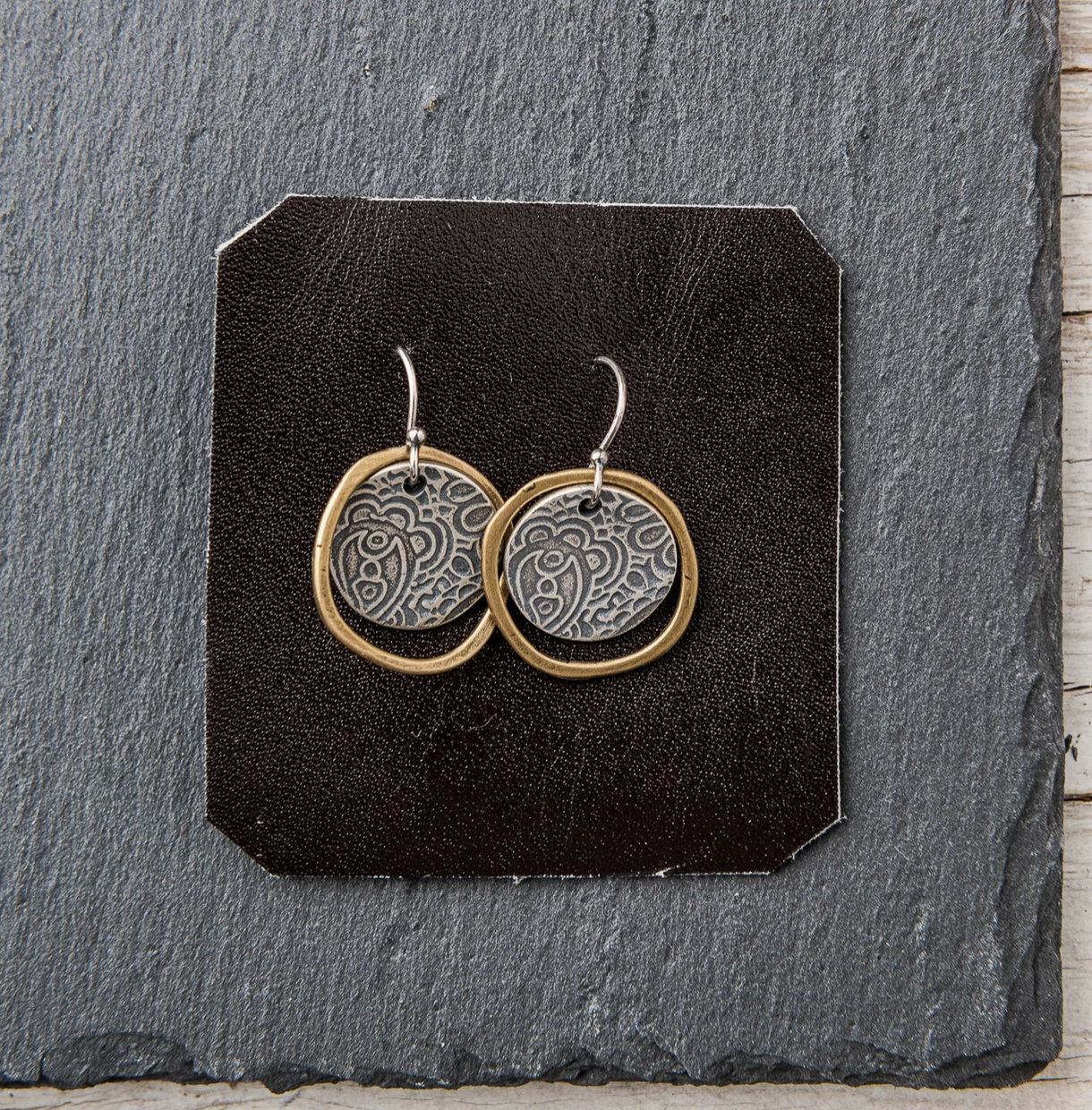 Silver Rustic Paisley Earrings Bronze Frames Detail.png