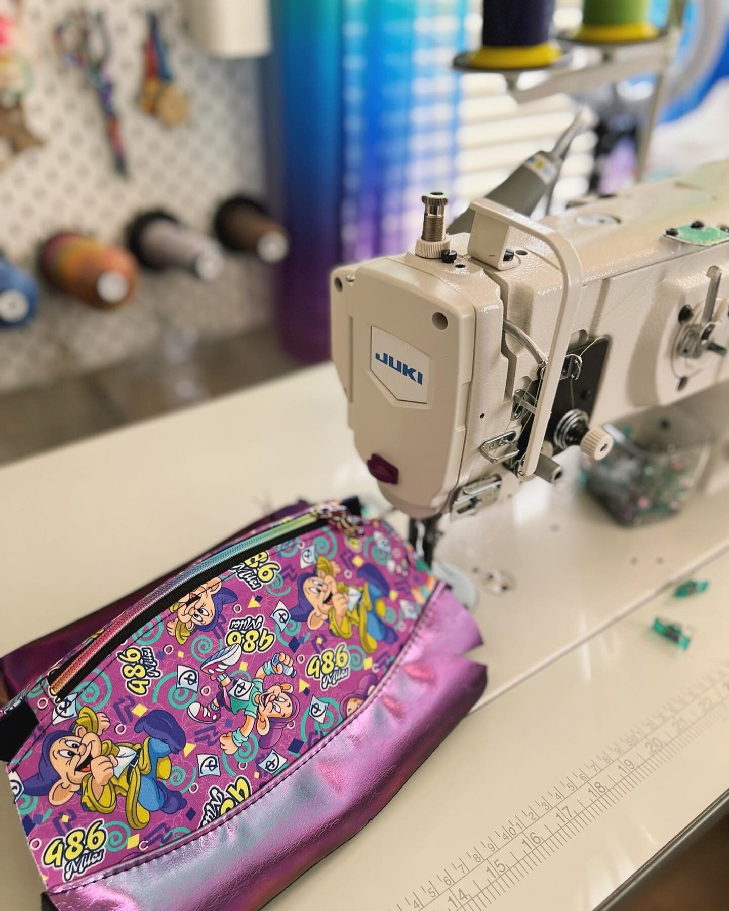 Sewing up some bags for my runners. 💜💚
