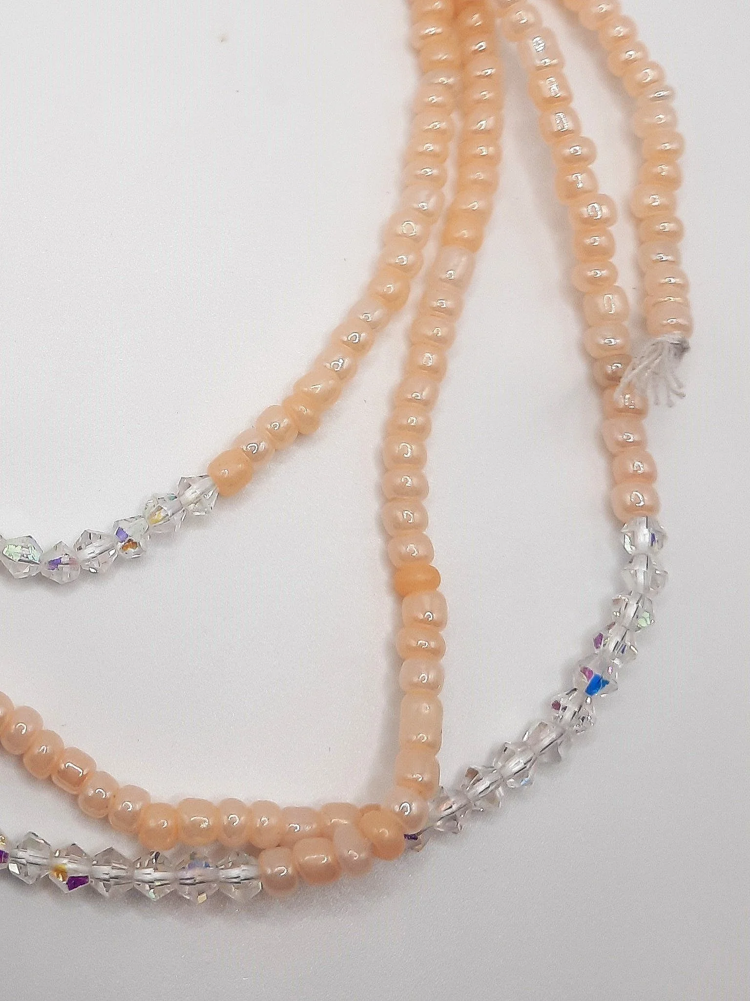 peach+and+clear+waist+beads+close+up.jpg