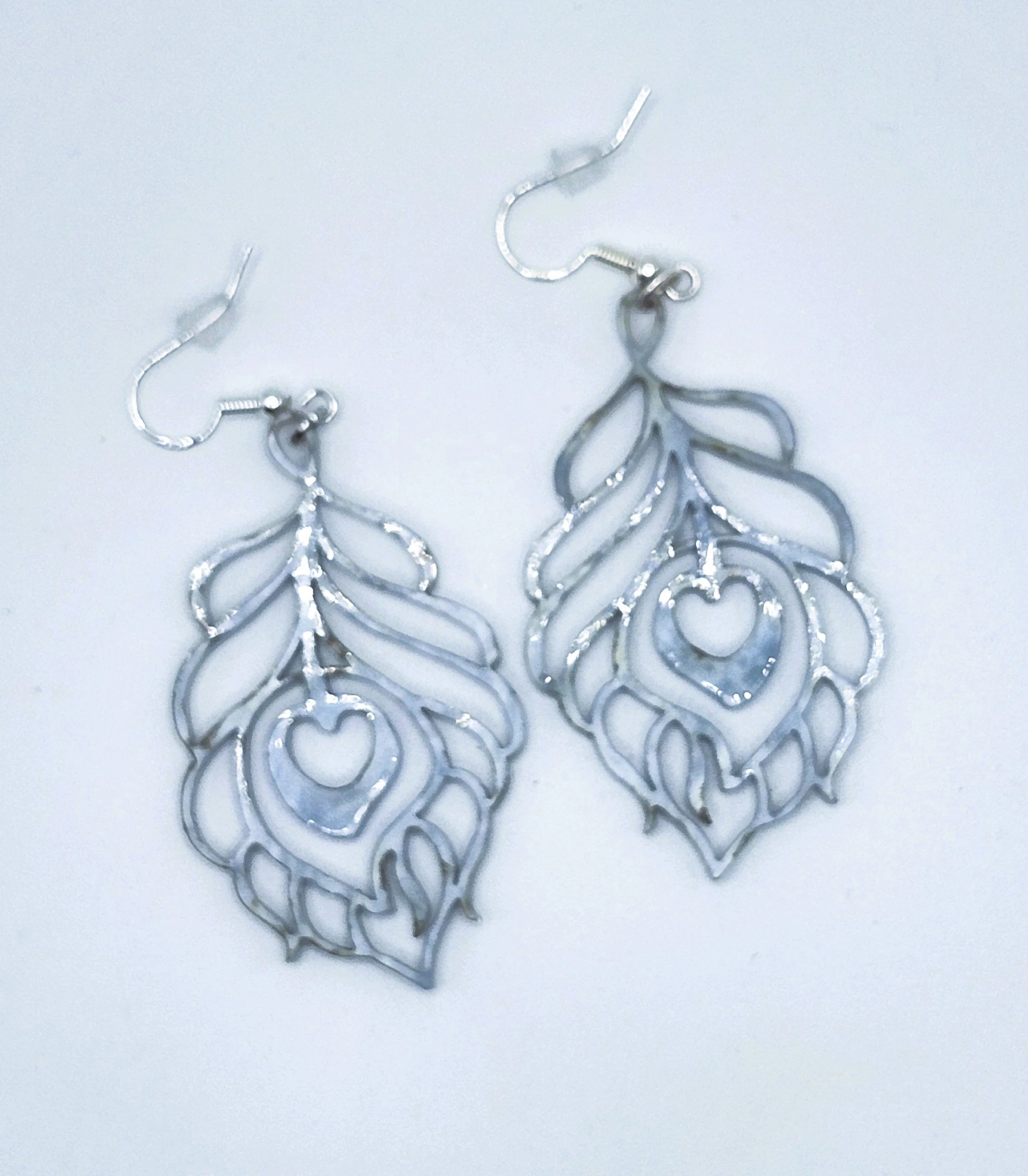 blue peacock feather earrings.jpg