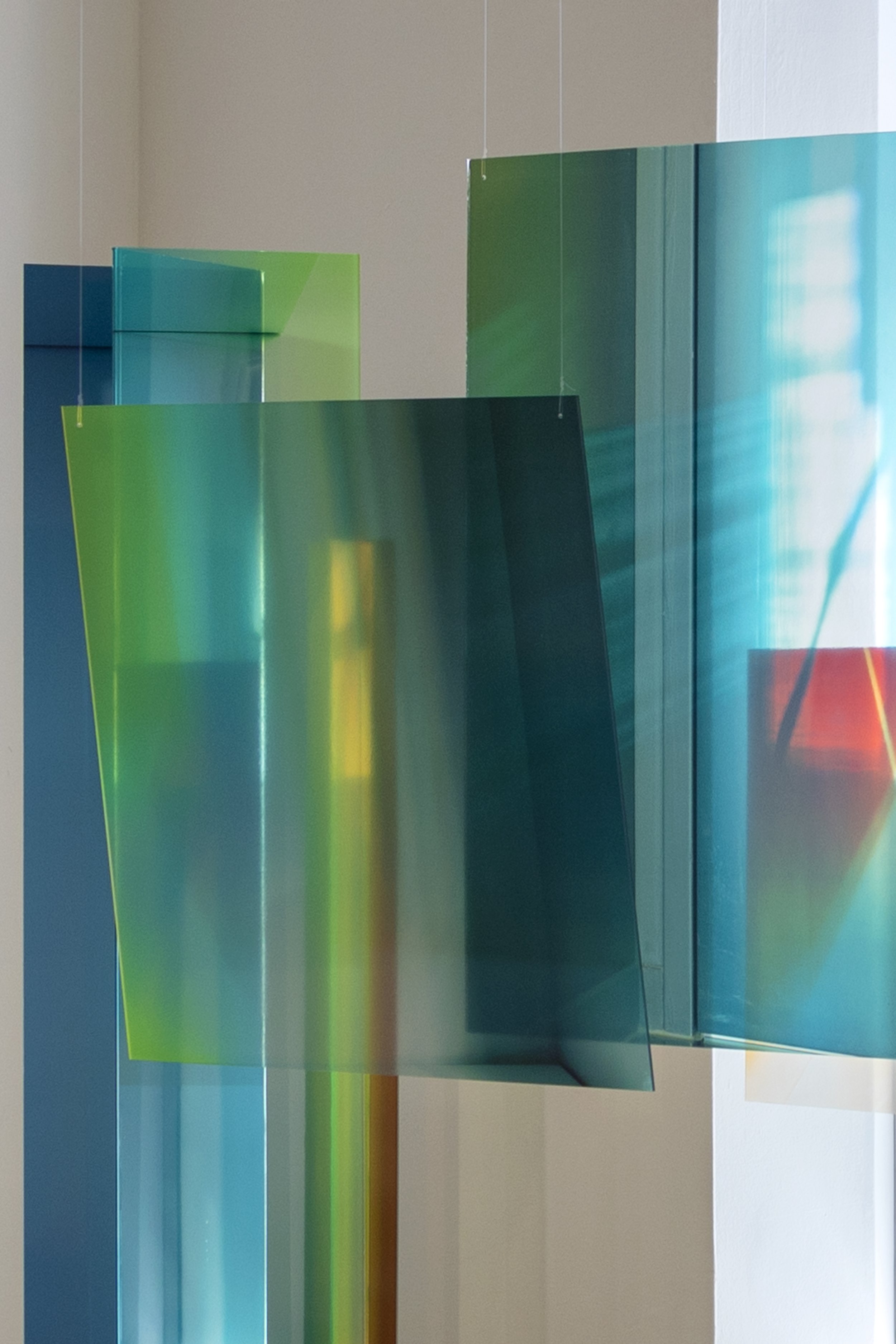 Interior Fractures (2025) / exhibition detail / Transparent Photo-Media, folded Acrylic, existing Architecture, Space, Light / Dimensions Variable