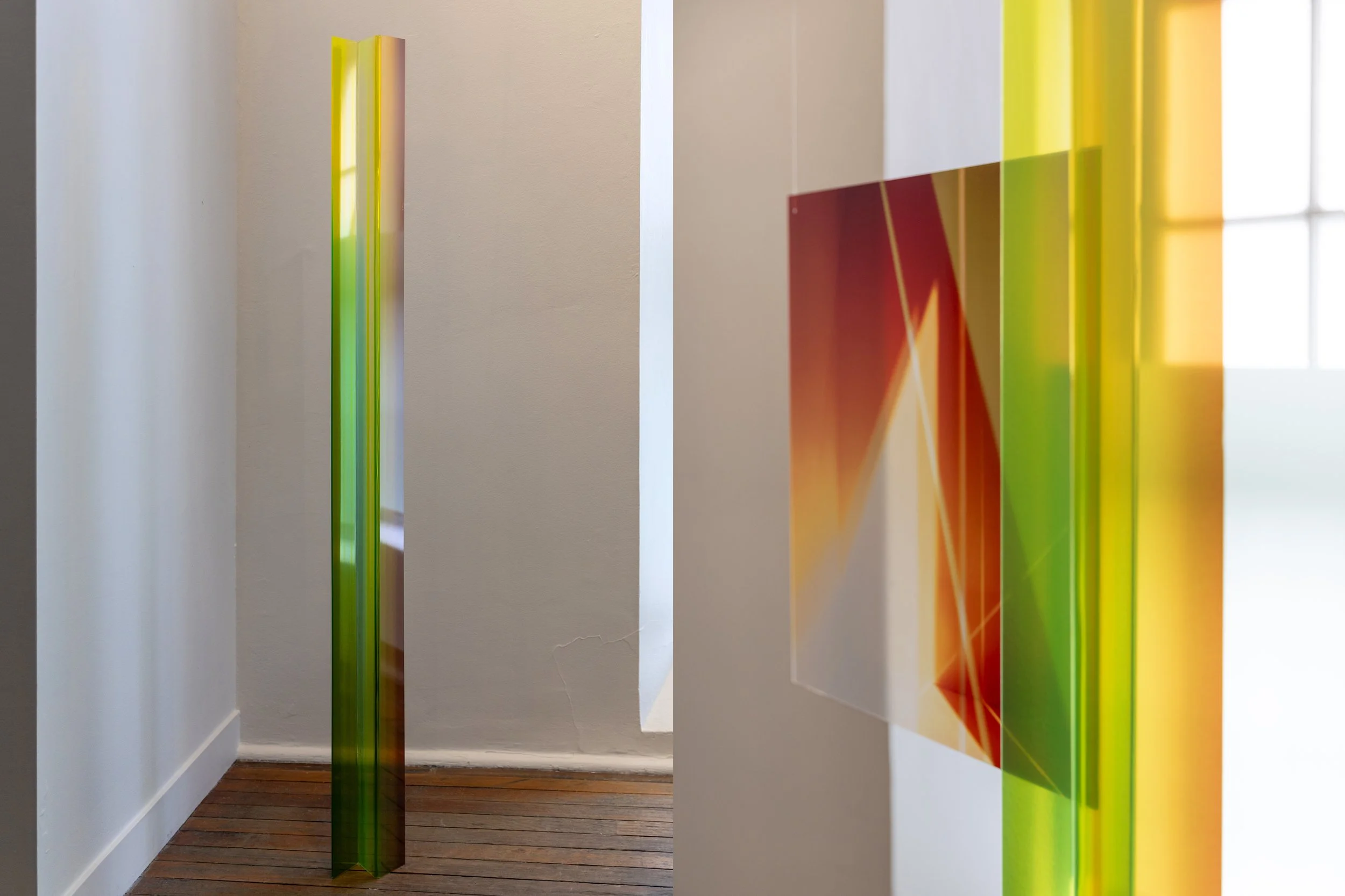 Folding (2025) / Right Install View Detail / transparent photo-media, folded acrylic, space, light, reflection / 2100 x 300 x 450 mm