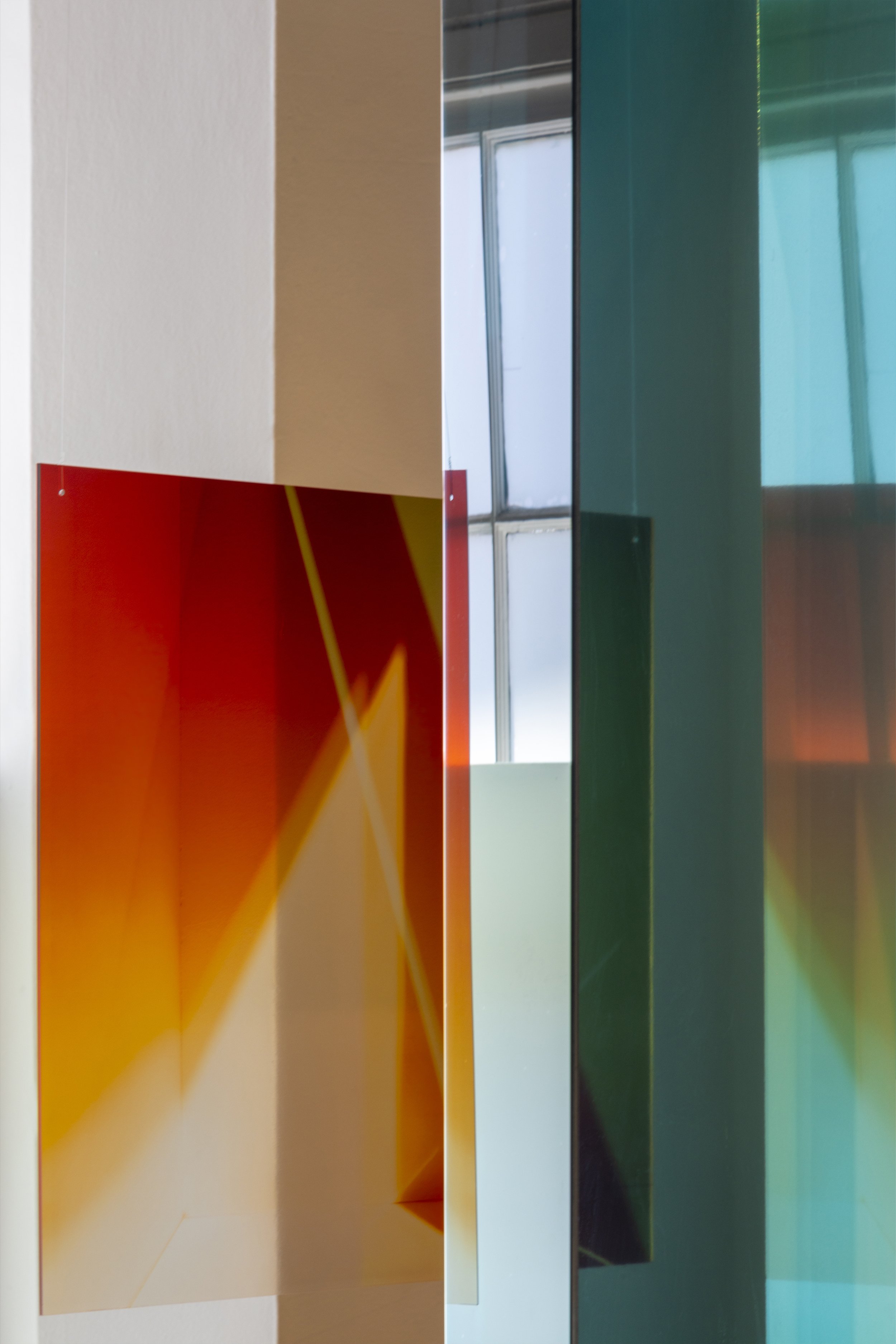 Interior Fractures (2025) / exhibition detail / install view / transparent photo-media, folded acrylic, existing architecture, space, light, reflection / dimensions variable