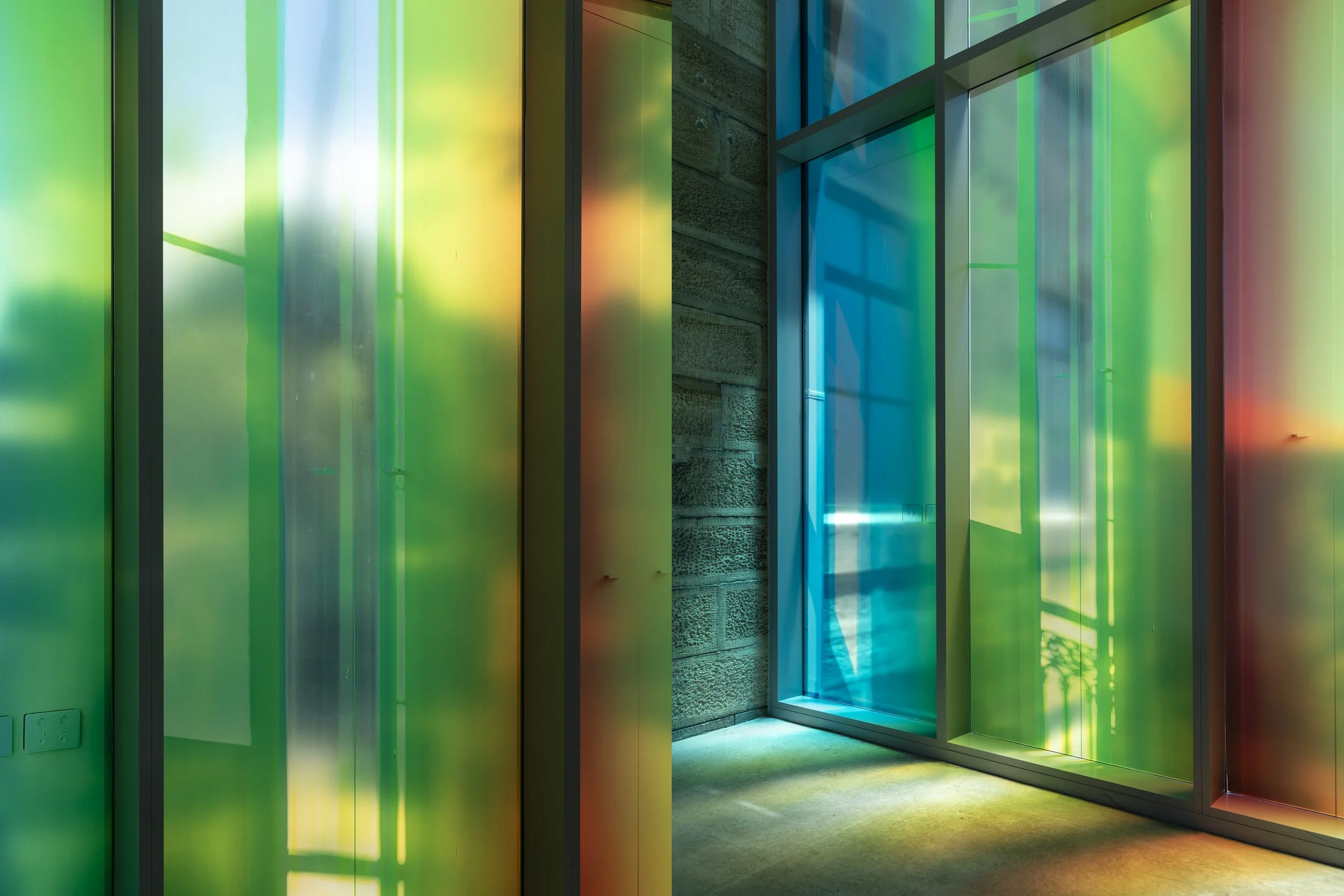 unfold, unfolded, unfolding (2025) / site-specific install - photo-media, existing architecture, space, light / 3620 x 2955 mm - dimensions variable / National Art School Gallery - Upstairs Walkway