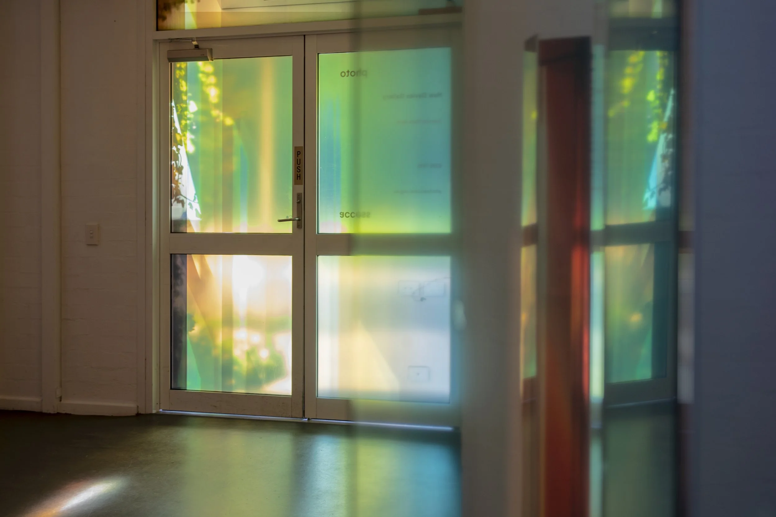 Unfold, Unfolded, Unfolding 2026 / Transparent Photo-Media attached to Door, Existing Architecture, Space & Light / Print size 180 X 225 cms / Artwork Dimension Variable