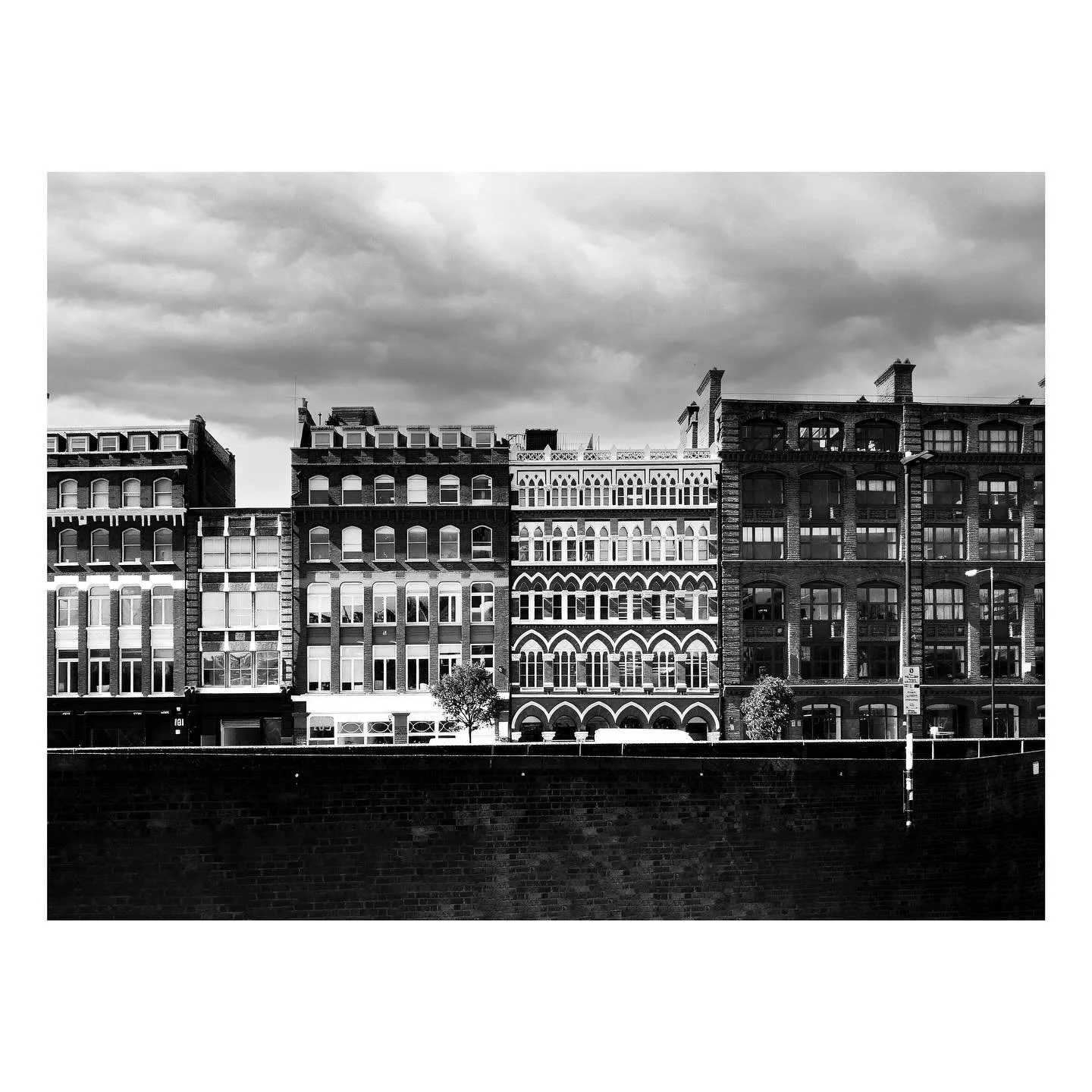 The impact of the railway cutting through at ground level is almost like a canal or a wide avenue.  The run of commercial buildings in Farringdon in Central London benefits from a wide open space as a result.

Farringdon 
London
Railway
Frontage

#ar