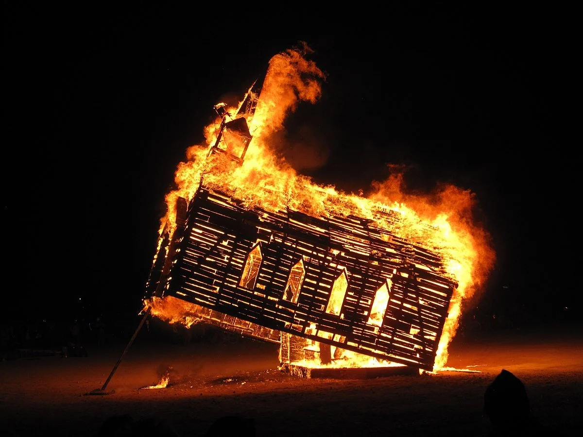 1200px-Burning_Man_2013_Church_Trap_fire_(9657162677).jpg