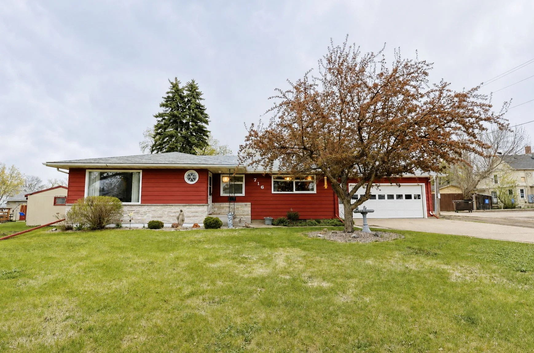 716 6th AVE NE  $219,900.  Unique Cornice molding in the living/dining area