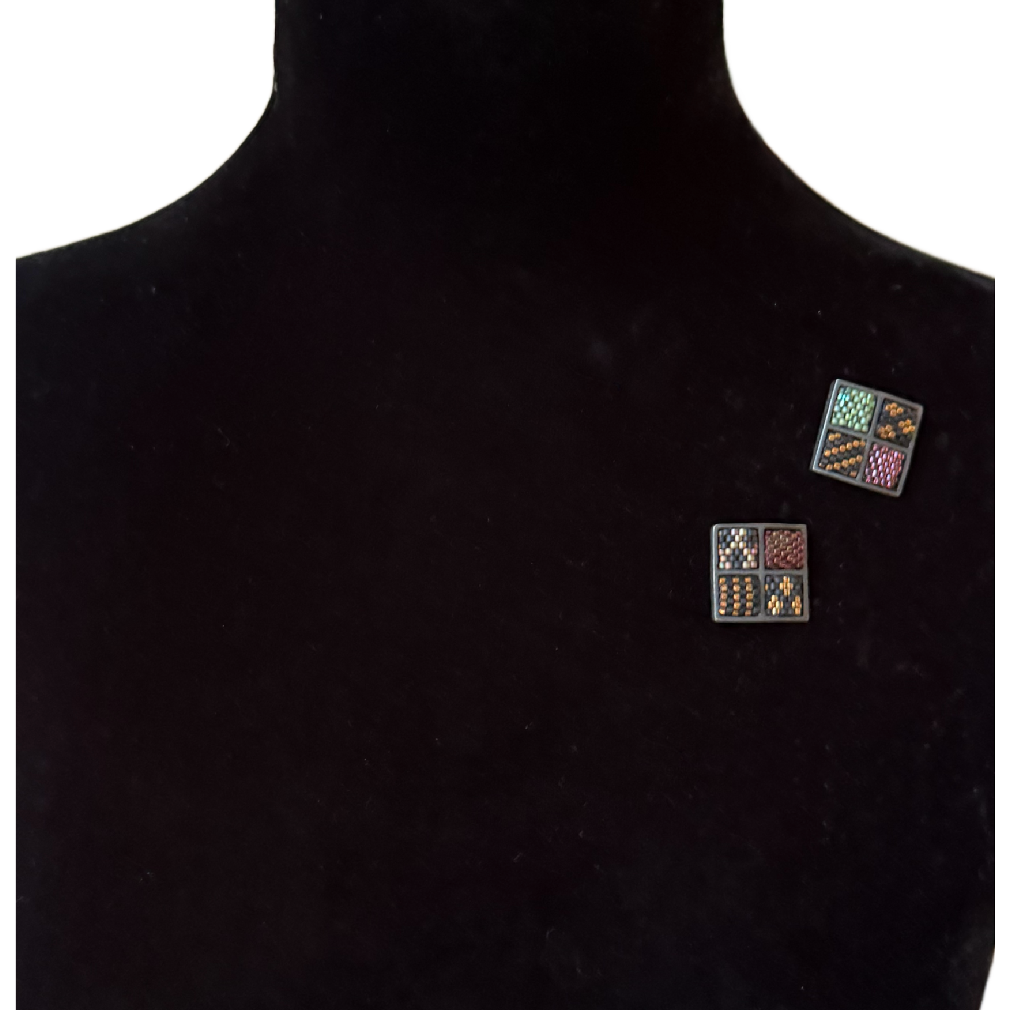 Two Confetti Lapel Pins on Model.png