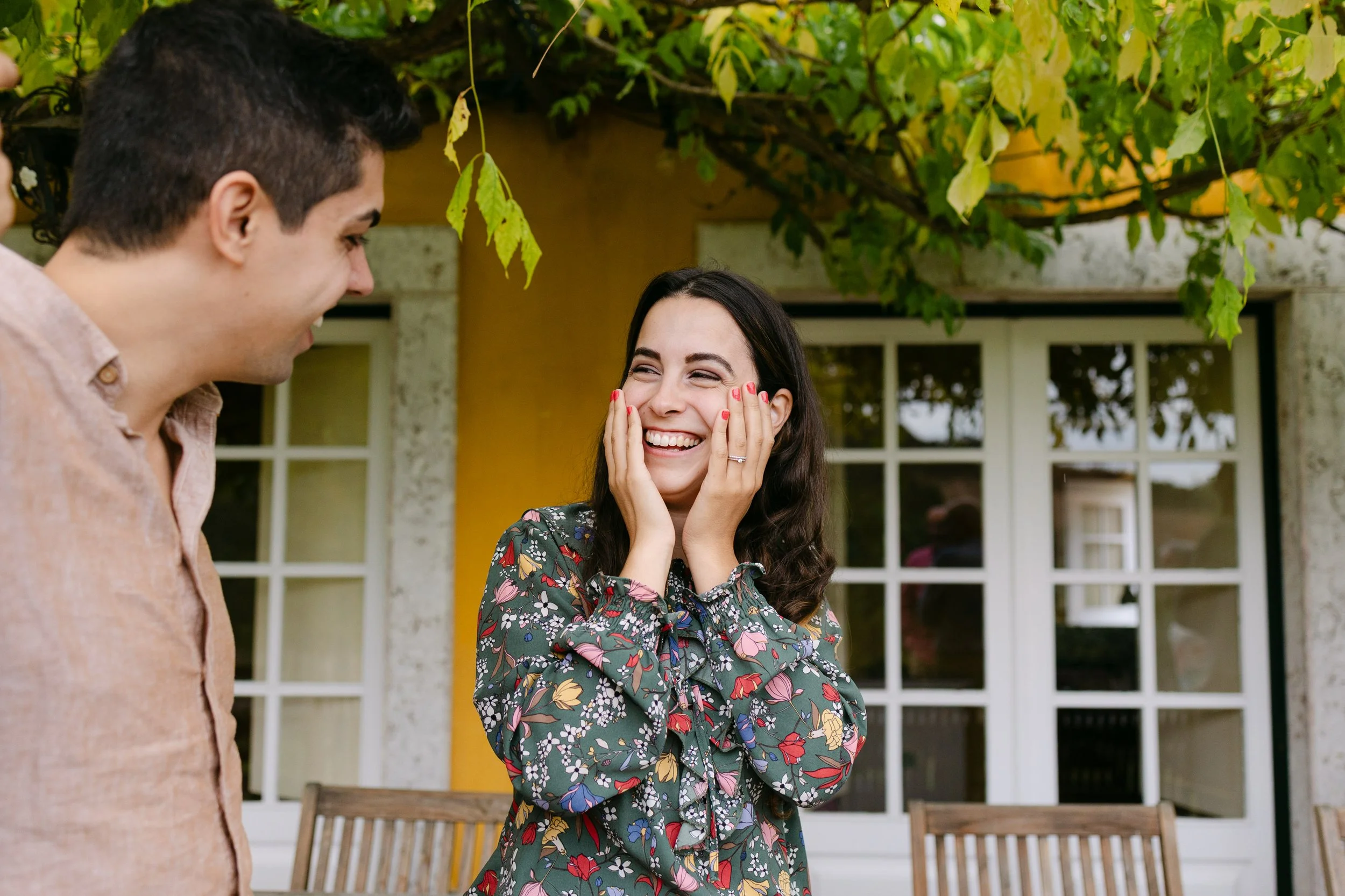 Bride-to-be reacting emotionally after romantic proposal at Quinta de Santana