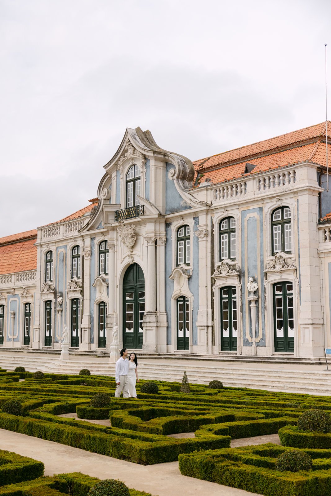 Palácio de Queluz gardens and architecture during an engagement photoshoot near Lisbon.