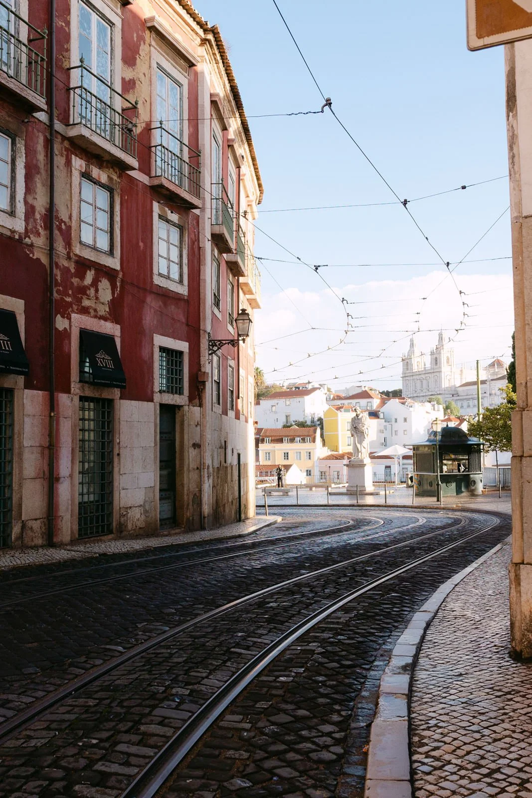 Historic Alfama street near Portas do Sol in Lisbon, Portugal
