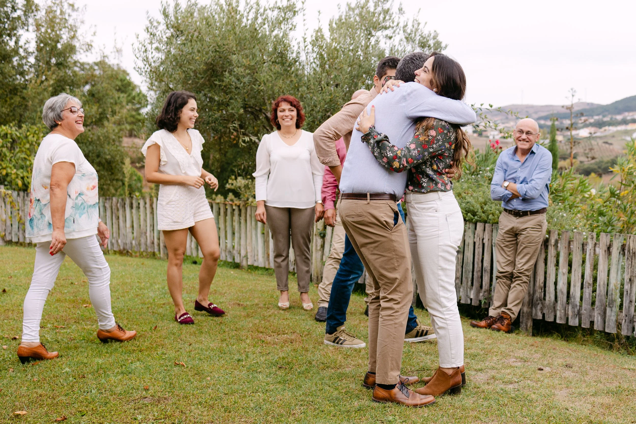 Family celebrating romantic proposal at Quinta de Santana vineyard