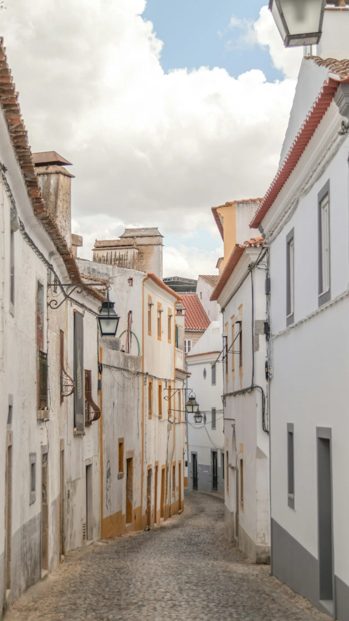 Traditional whitewashed street in Alentejo, Portugal.