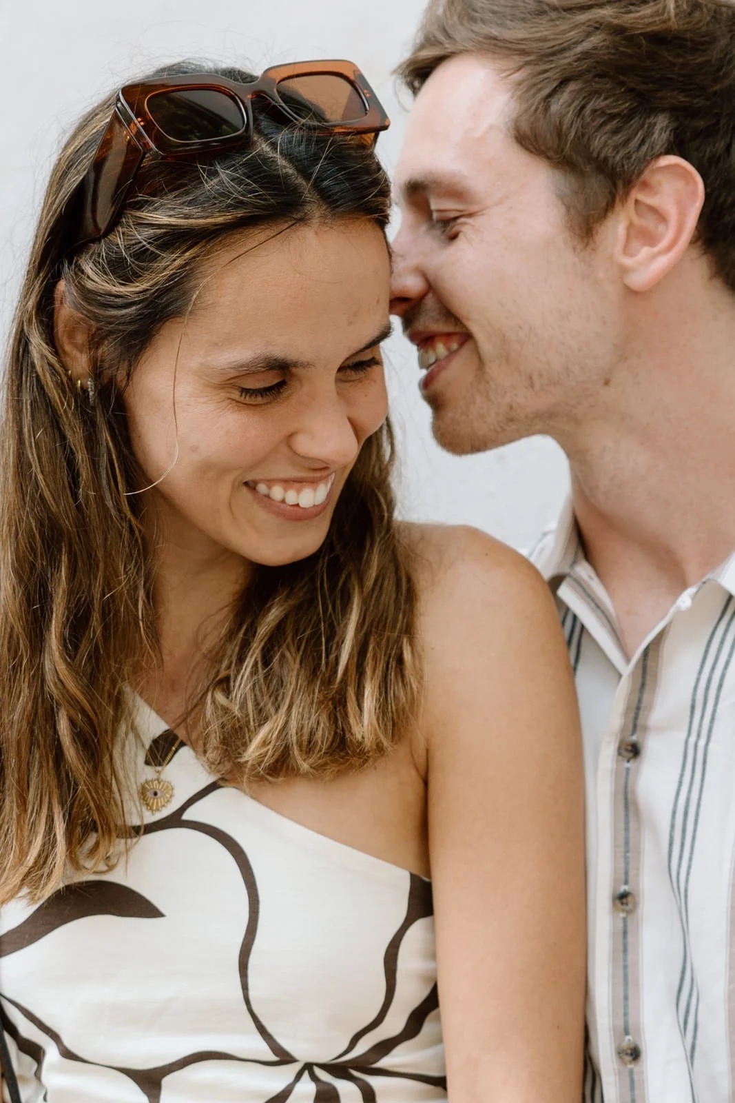 Natural engagement photography in Sintra Village capturing genuine moments between a newly engaged couple.