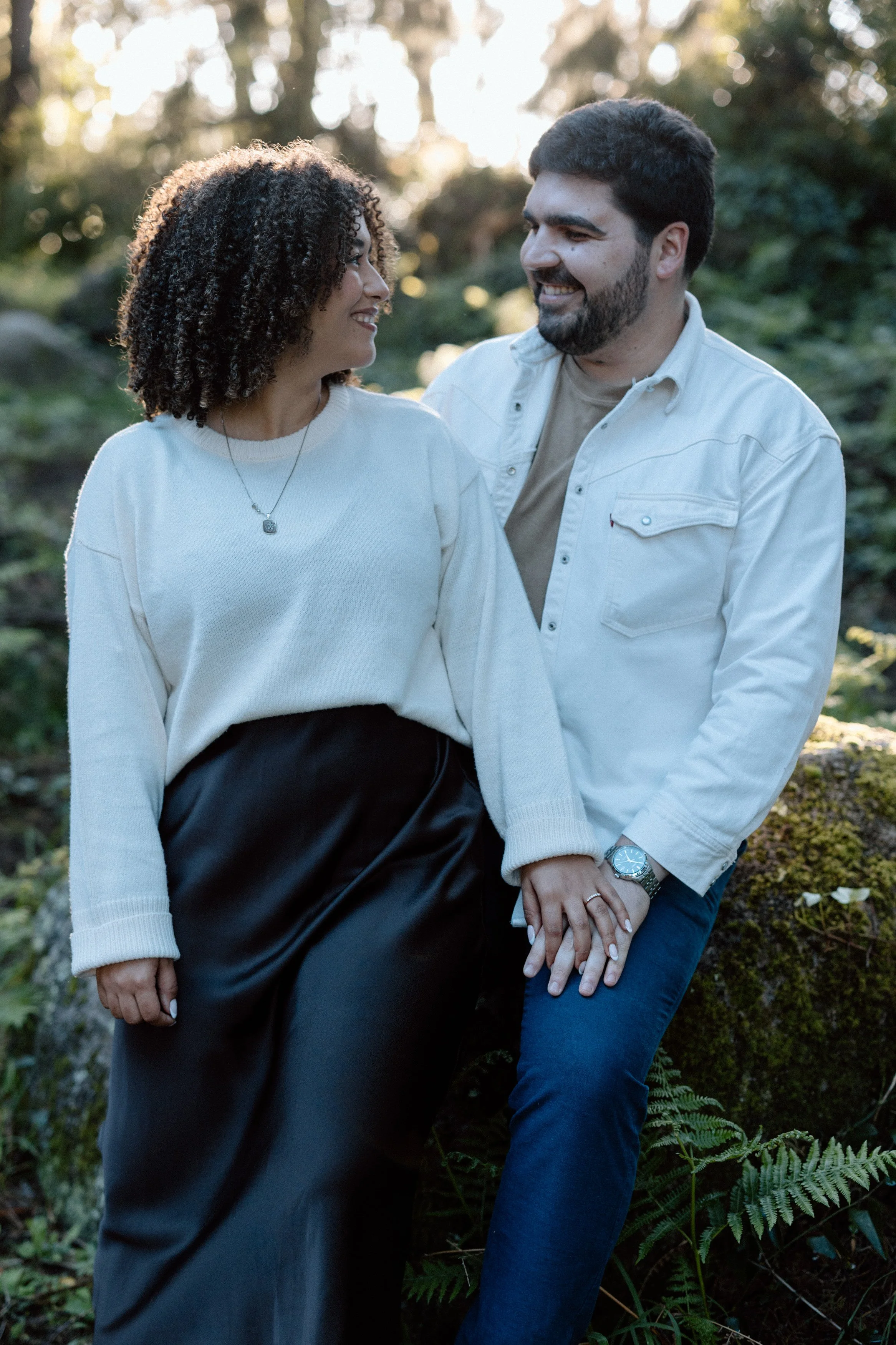 Romantic portrait of engaged couple in forest at golden hour in Sintra Portugal