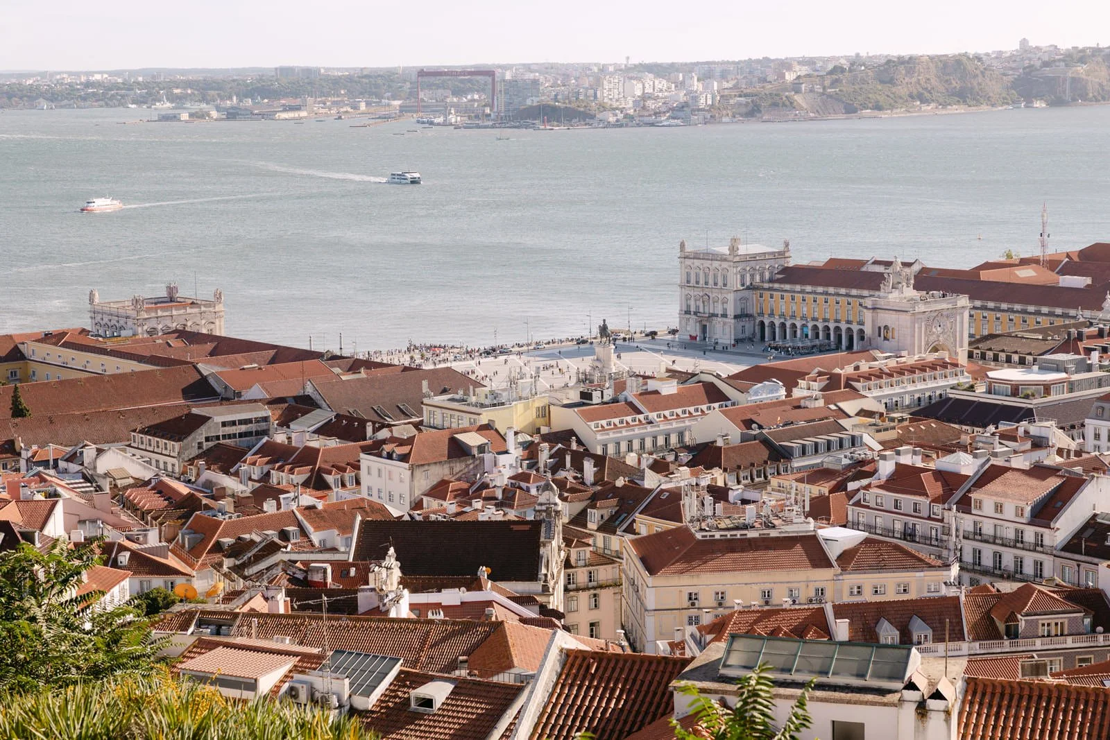 View of Lisbon rooftops and Praça do Comércio from Castelo de São Jorge