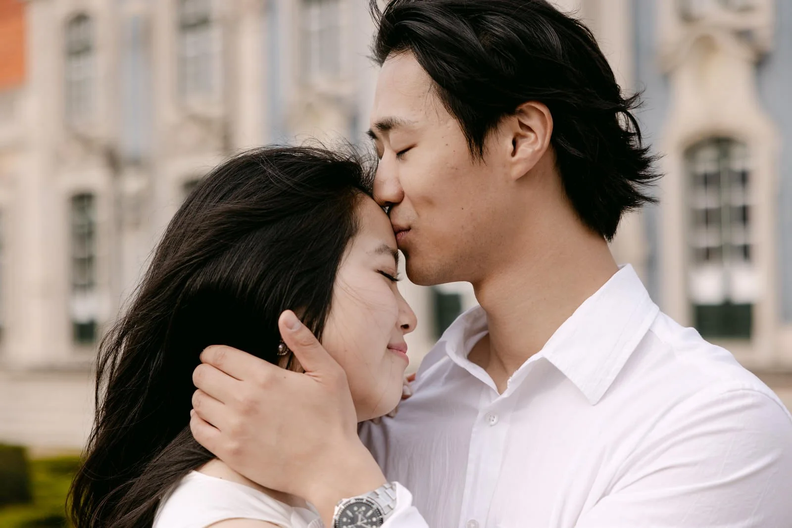 Romantic close-up portrait of engaged couple at Palácio de Queluz.
