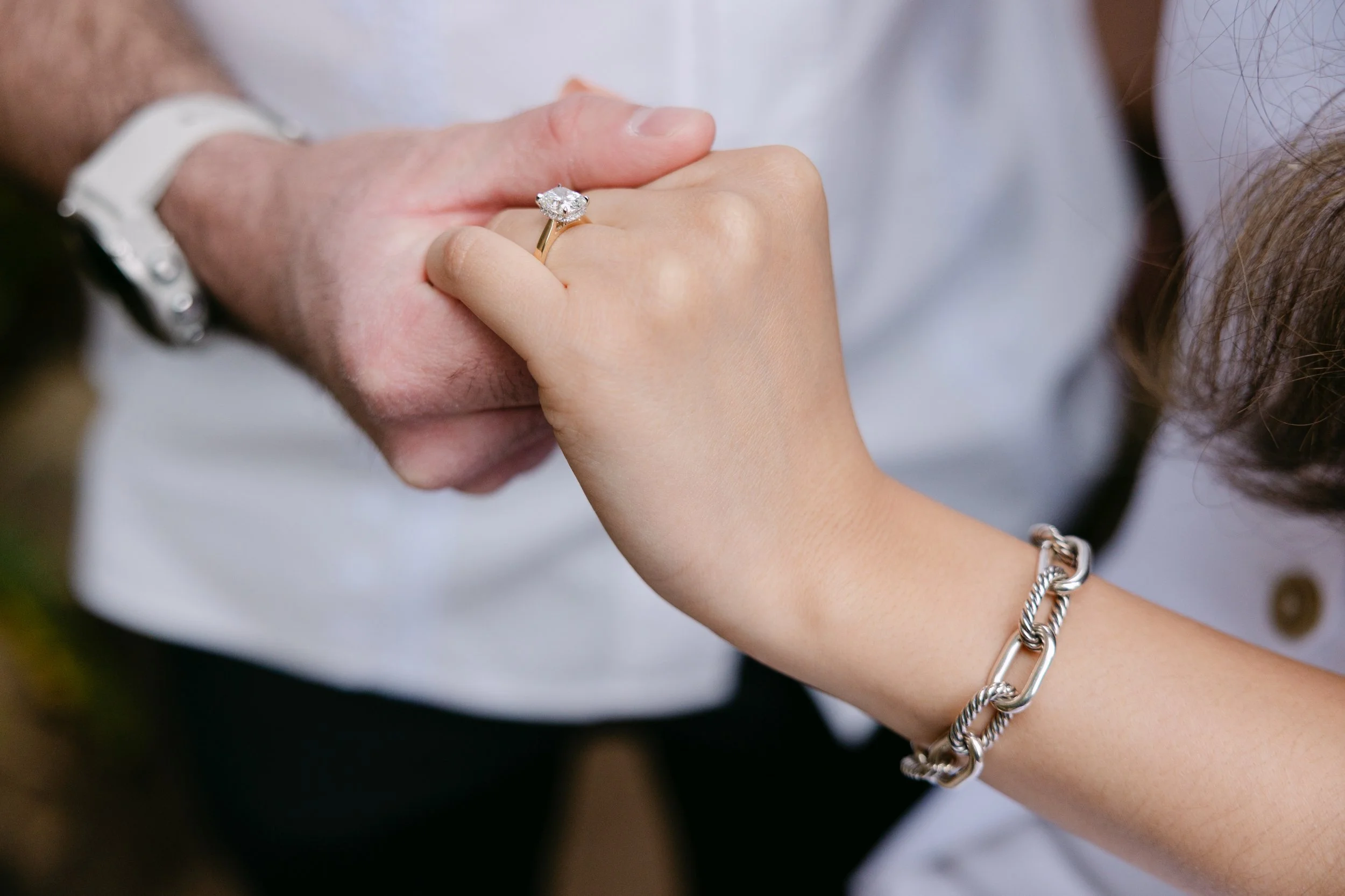 Close-up of engagement ring during surprise proposal photoshoot in Sintra, Portugal.