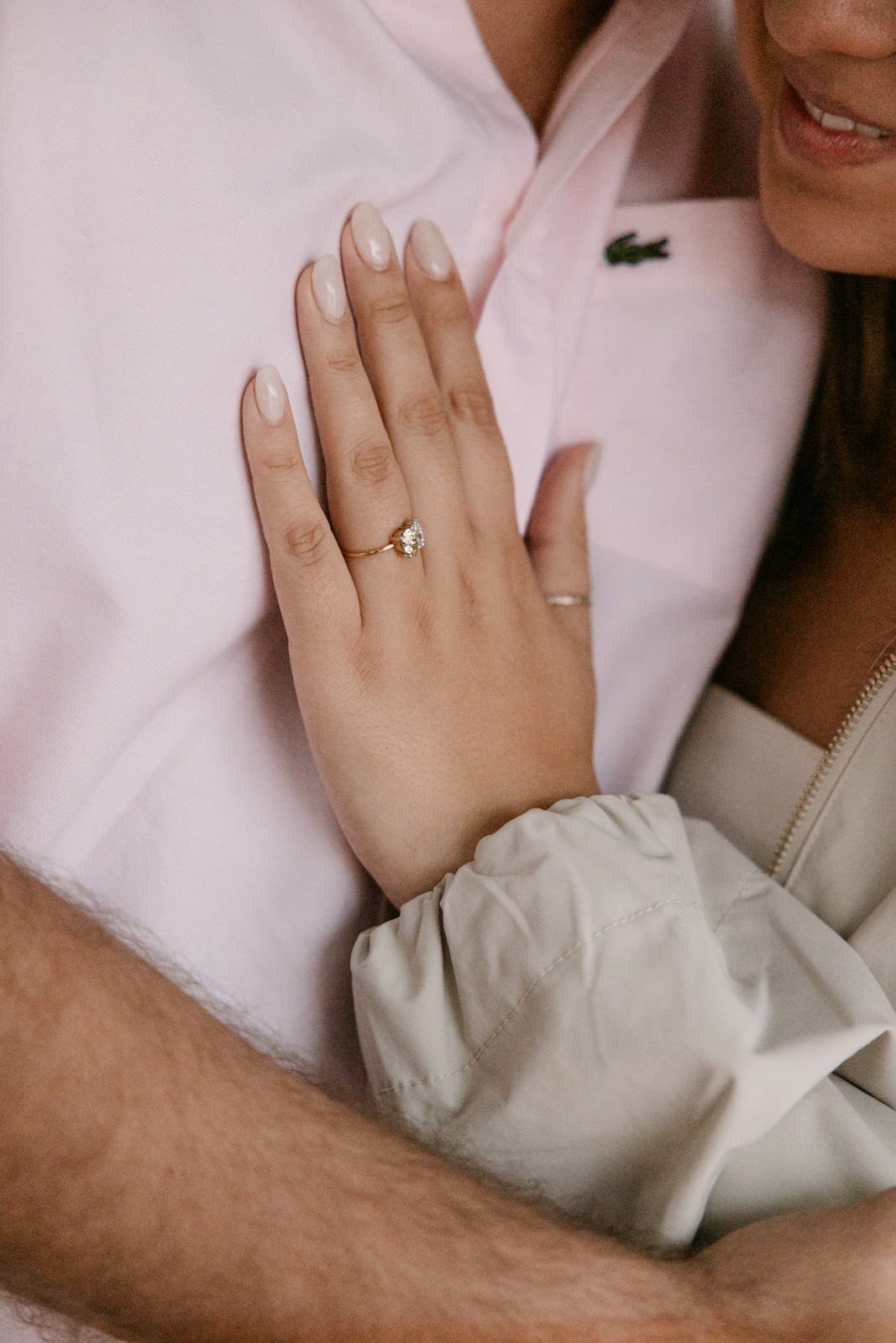 Engagement photos overlooking Lisbon rooftops and the Tagus River at Miradouro de Santa Luzia
