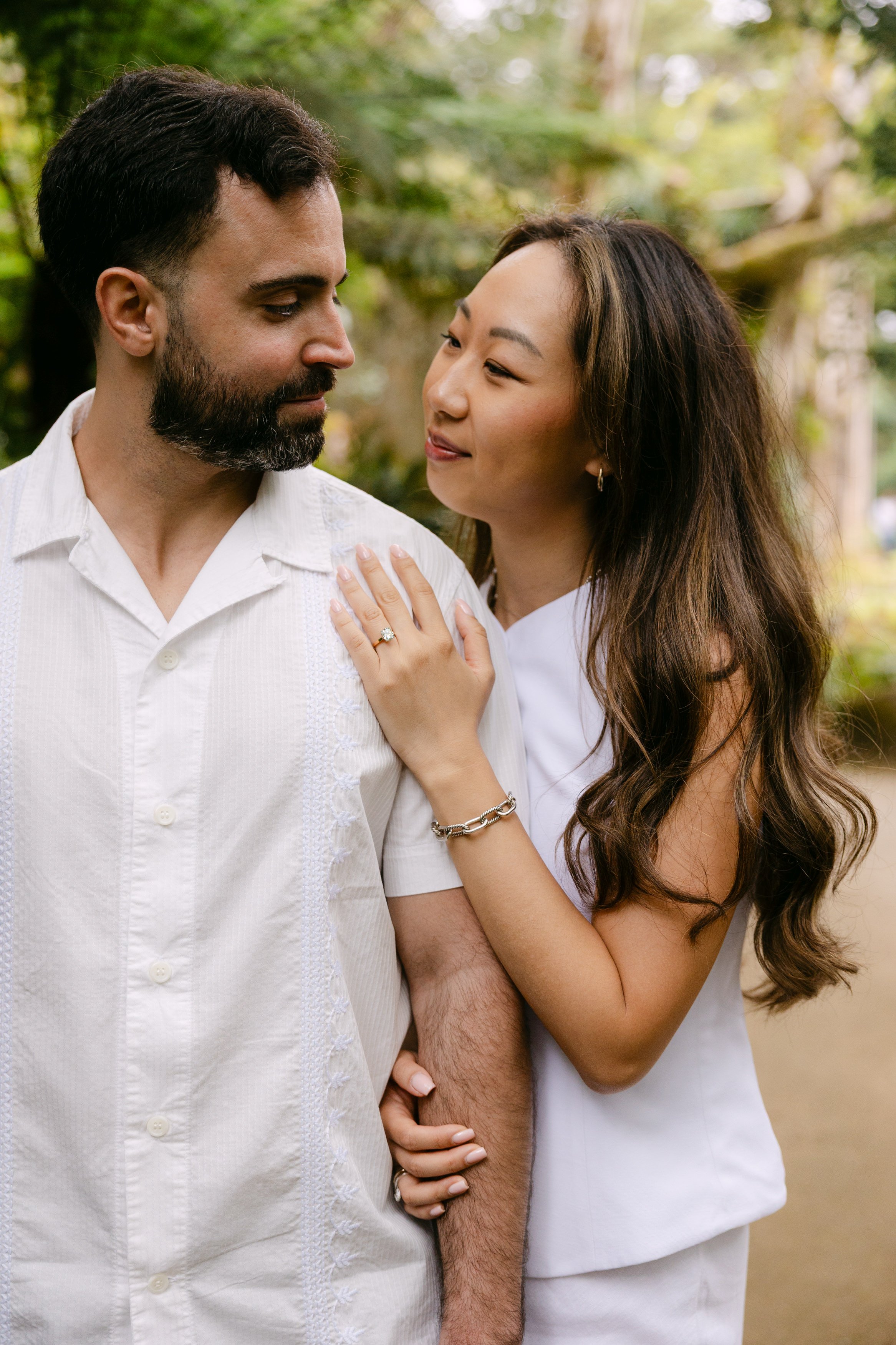 Romantic portrait of engaged couple during a proposal session at Monserrate Palace gardens.