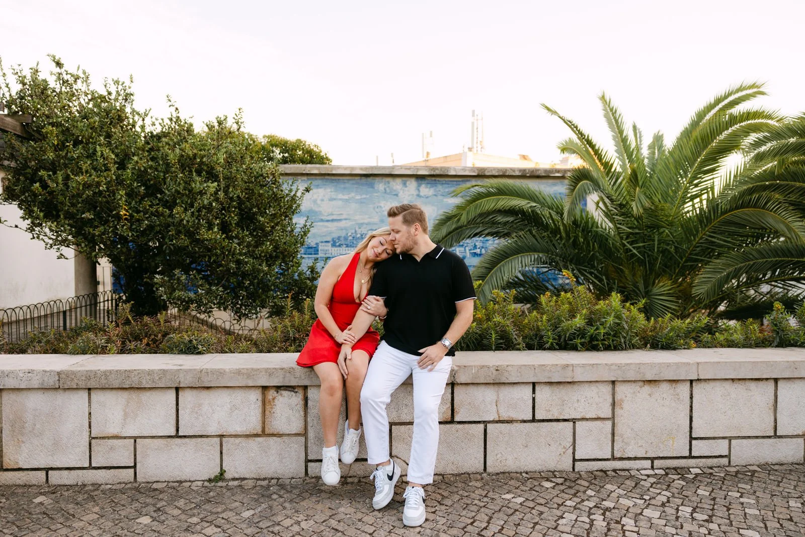 Couple enjoying the evening after getting engaged in Lisbon