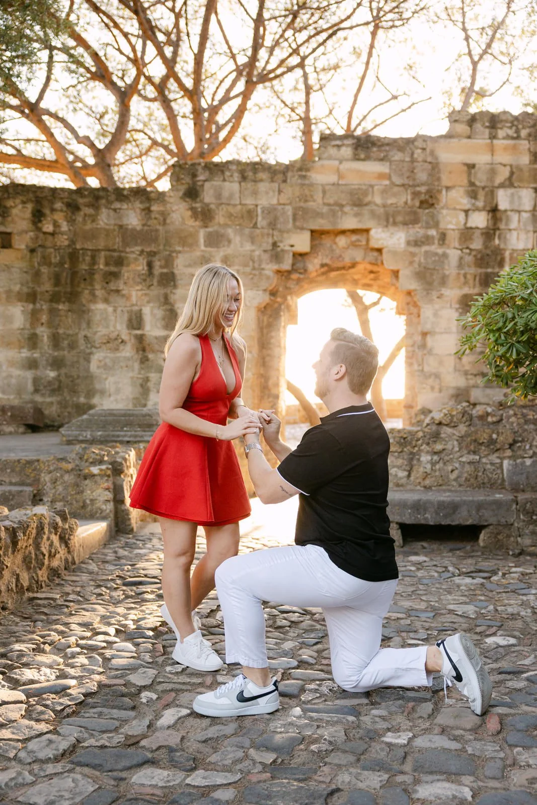 Emotional proposal reaction at Castelo de São Jorge in Lisbon