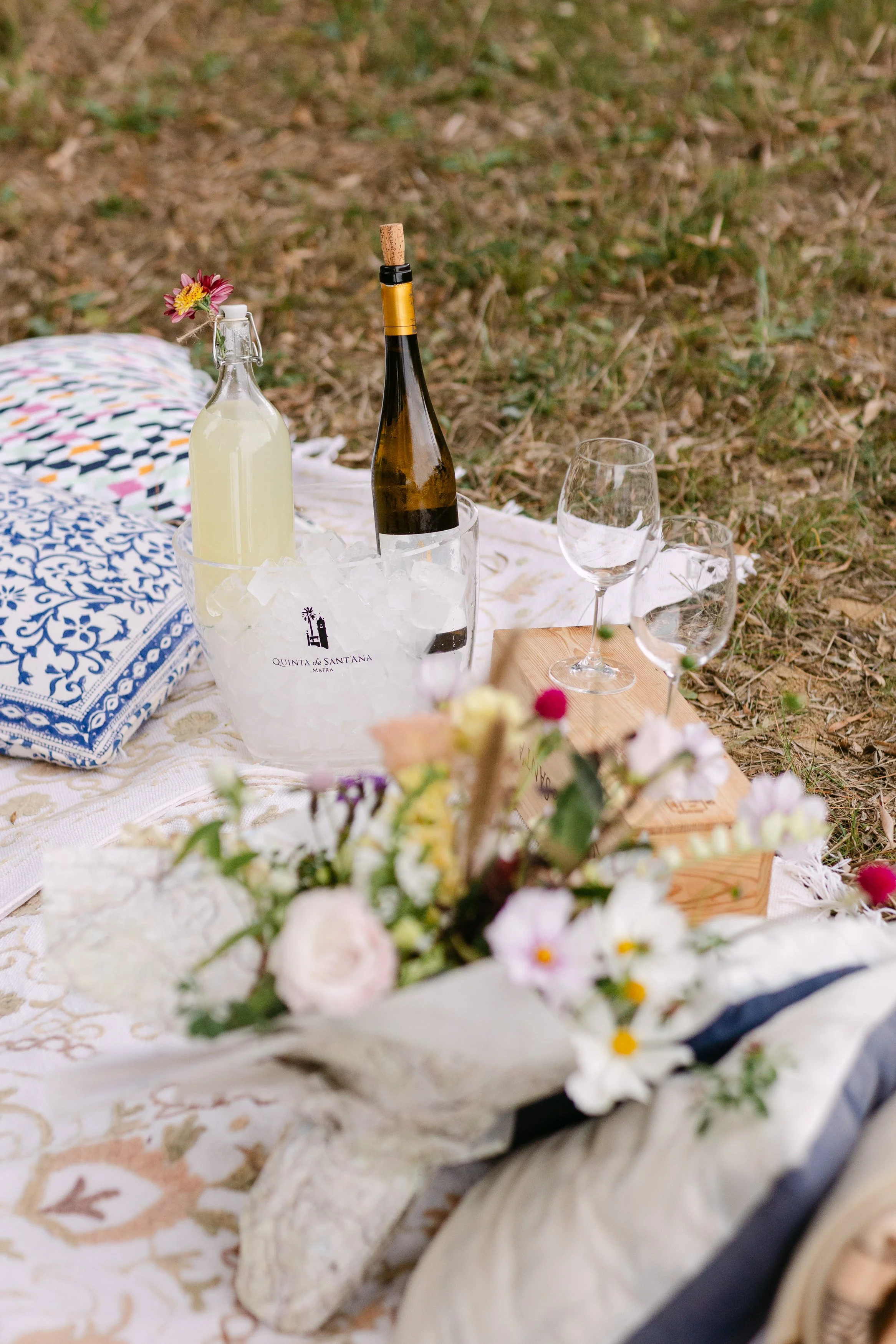 Close-up details of romantic vineyard picnic proposal setup in Portugal