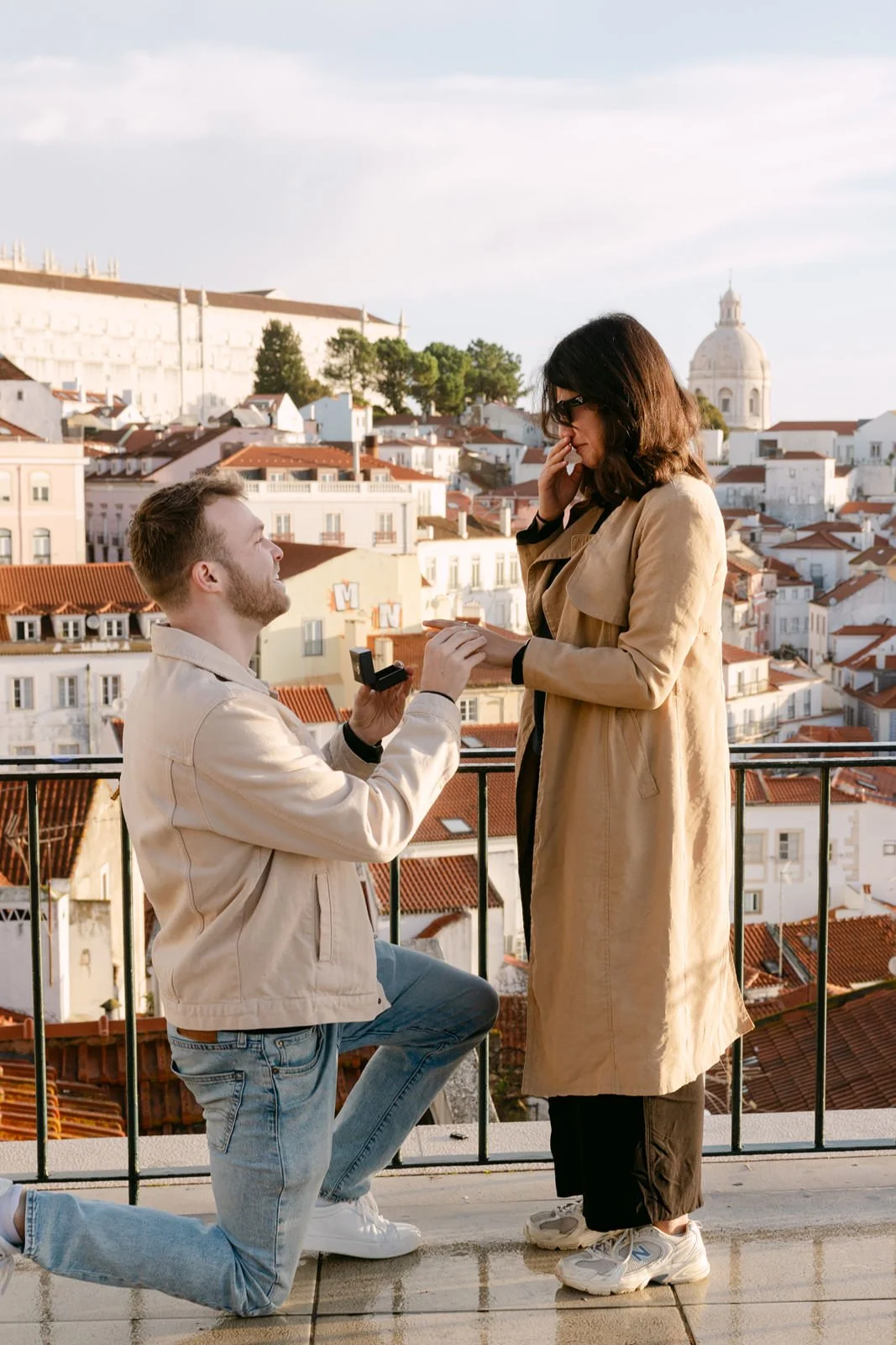 Close-up of a surprise proposal at Portas do Sol viewpoint in Lisbon