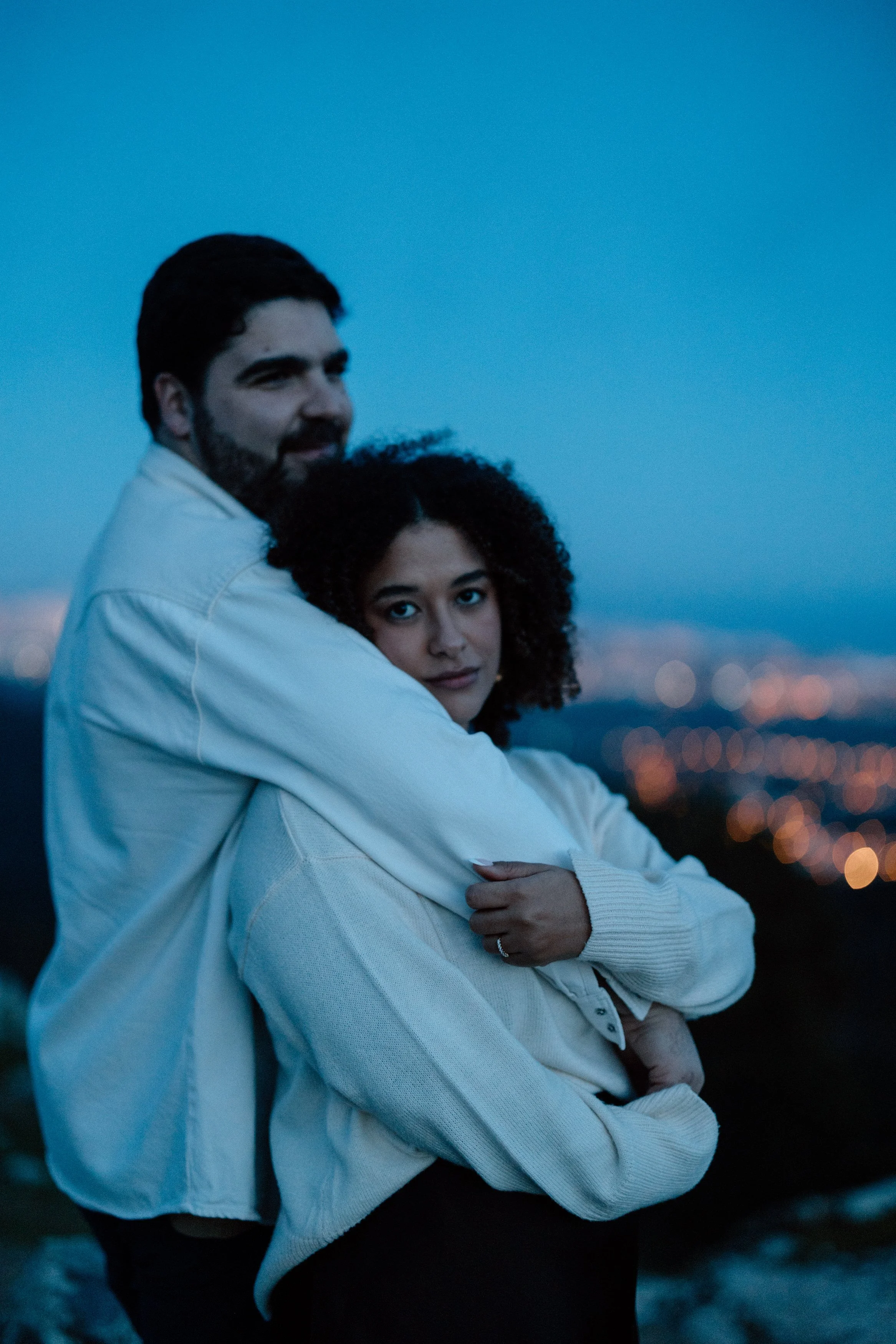 Romantic blue hour portrait of engaged couple embracing in Sintra Portugal