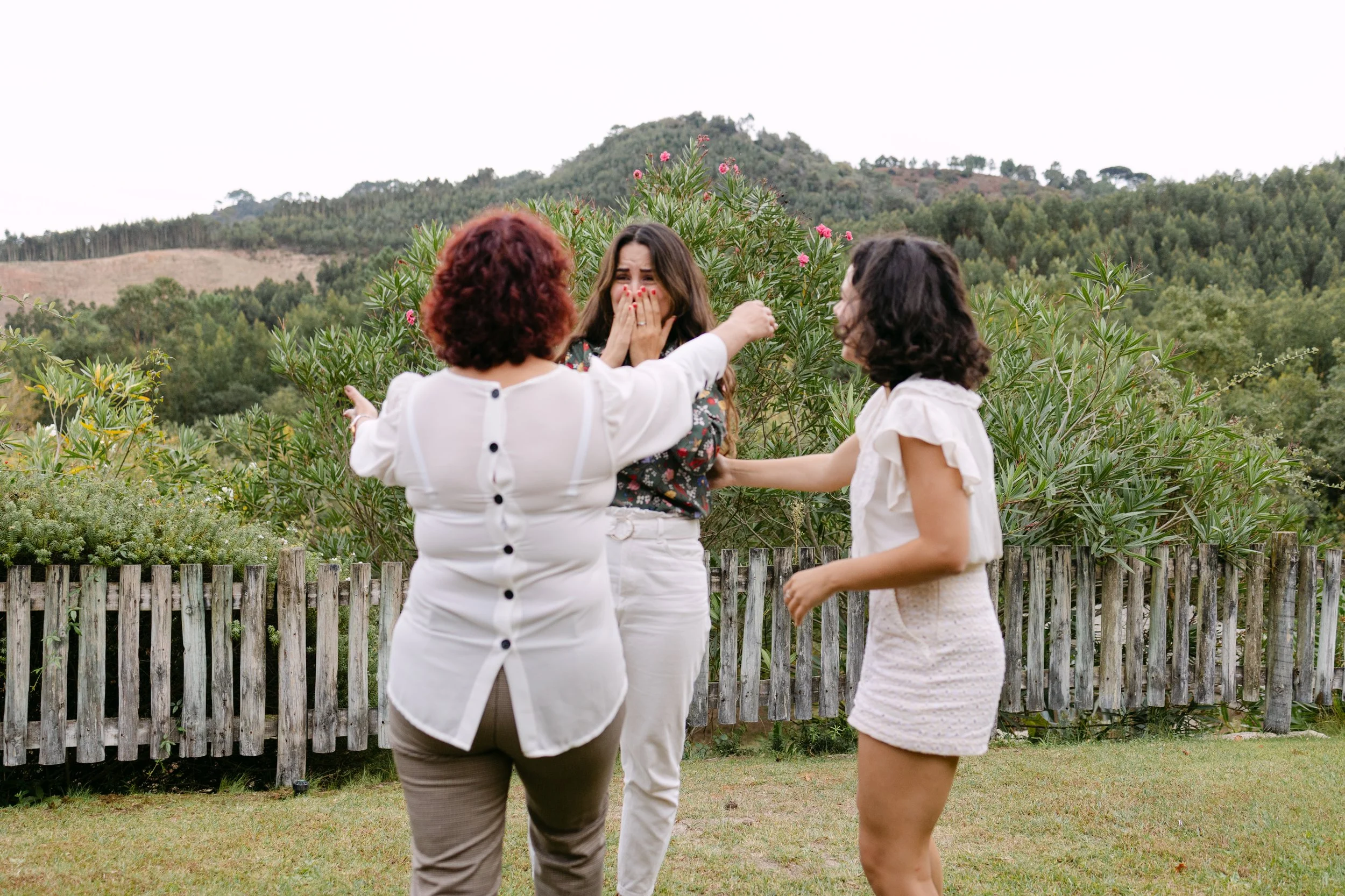 Couple celebrating with family after romantic vineyard proposal in Portugal