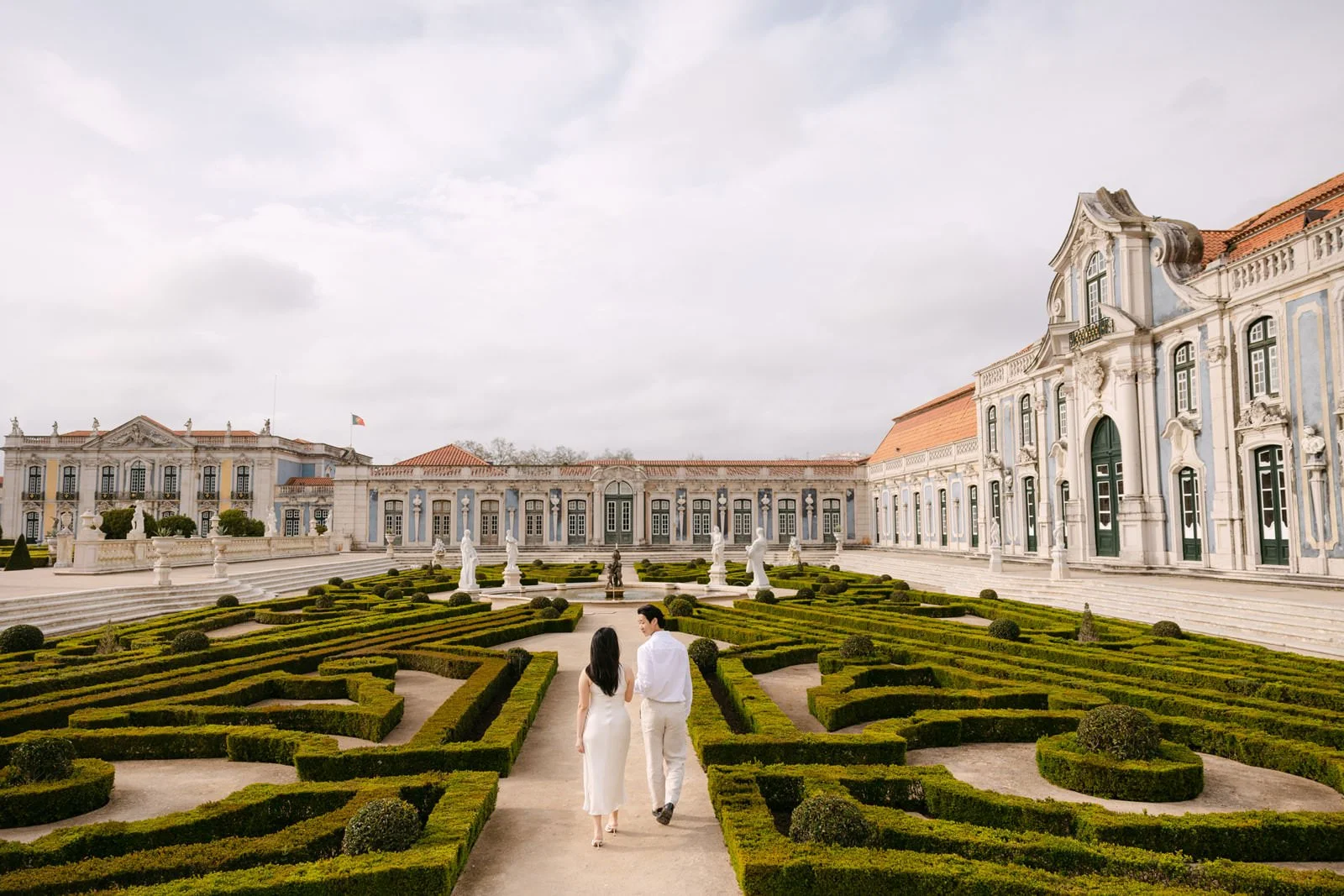 Palácio de Queluz gardens and architecture during an engagement photoshoot near Lisbon.