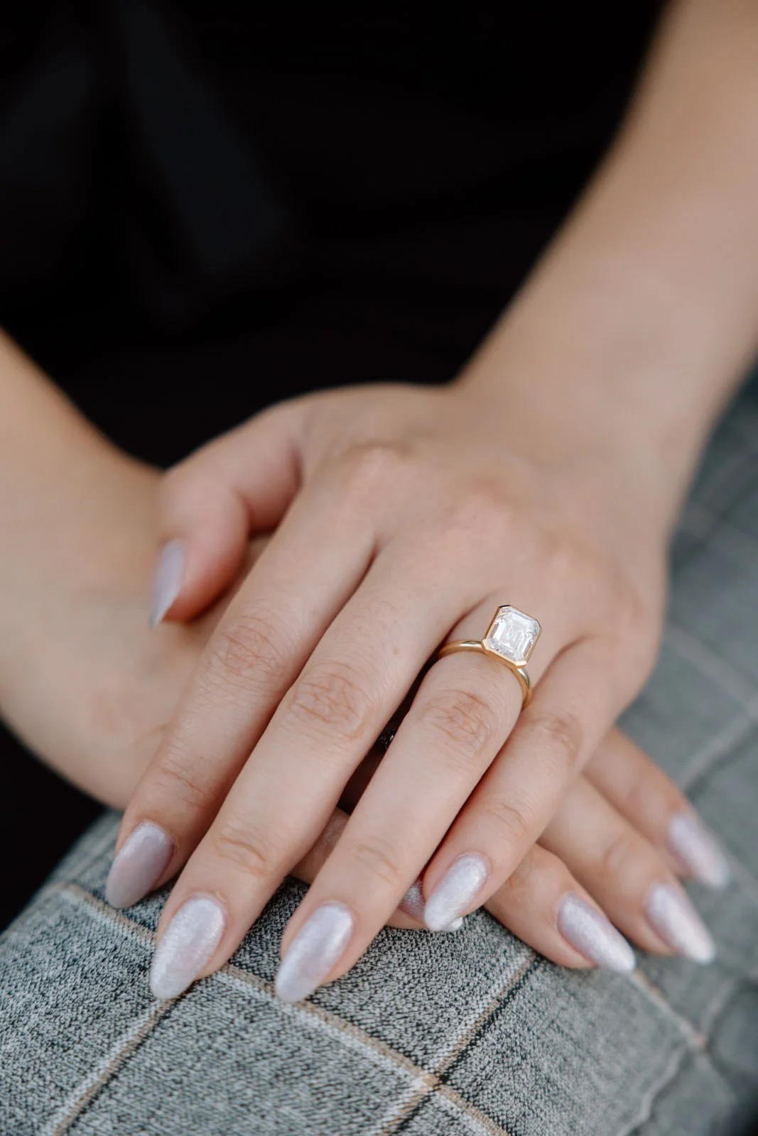 Close-up of an engagement ring photographed after a surprise proposal at Castelo de São Jorge in Lisbon.