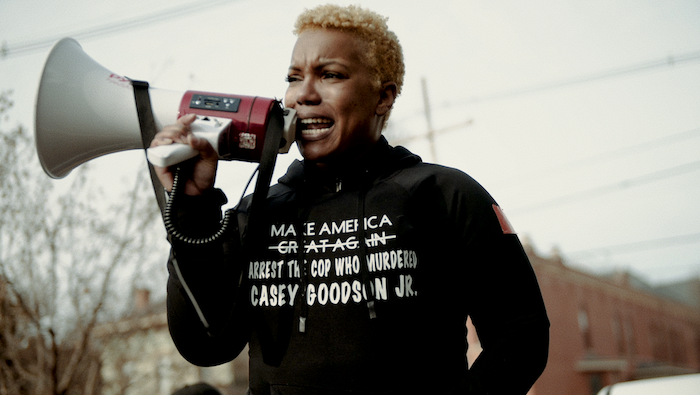 Black Lives Matter protestor shouting into megaphone