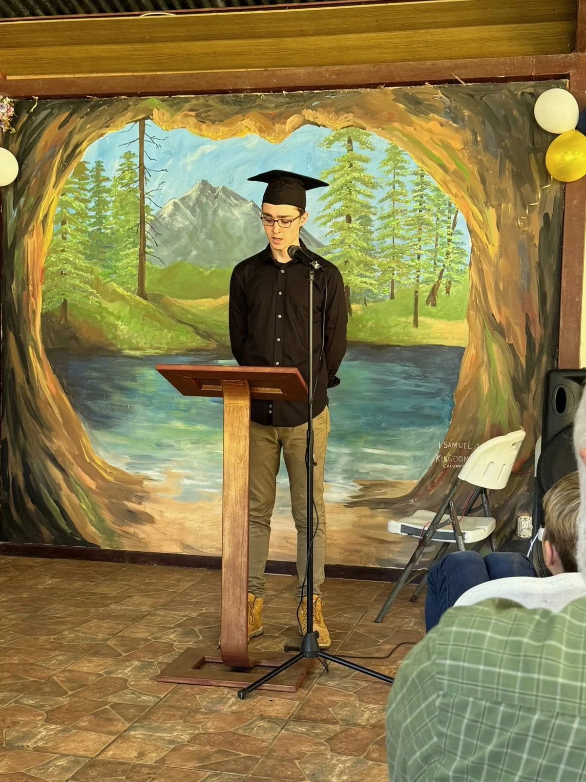 Aspen giving the valedictorian speech