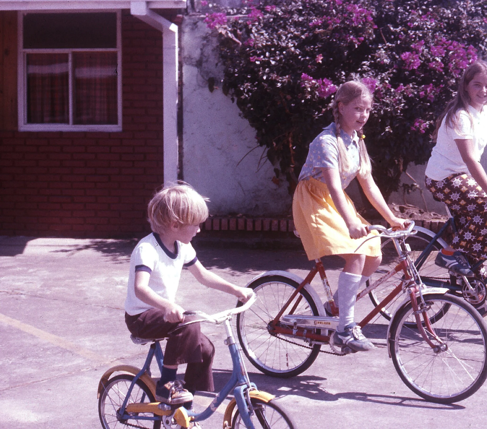 Dave and his sisters riding bike