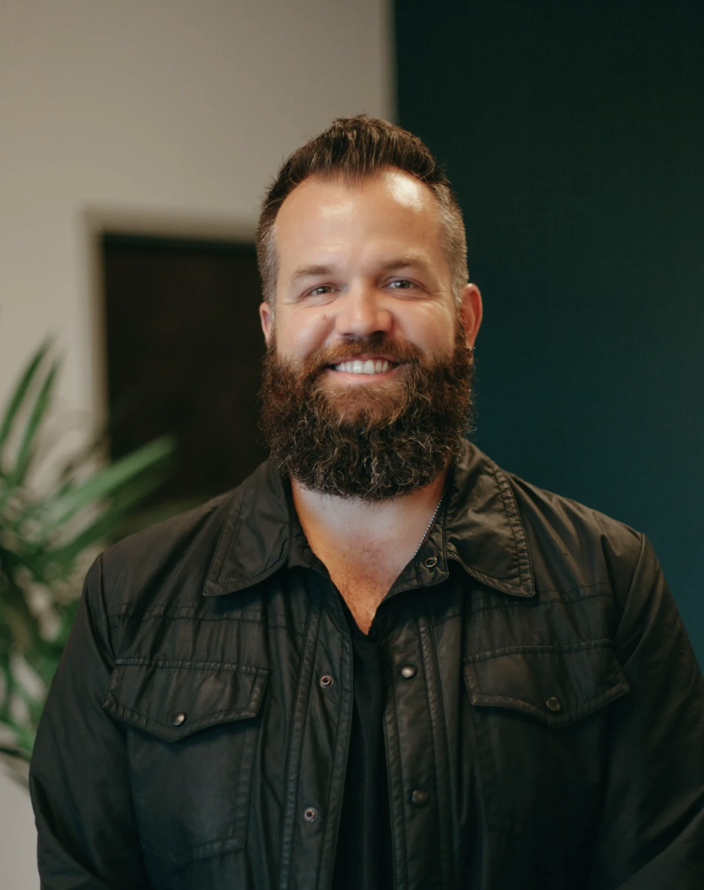 Beautifully bearded man in a button down shirt