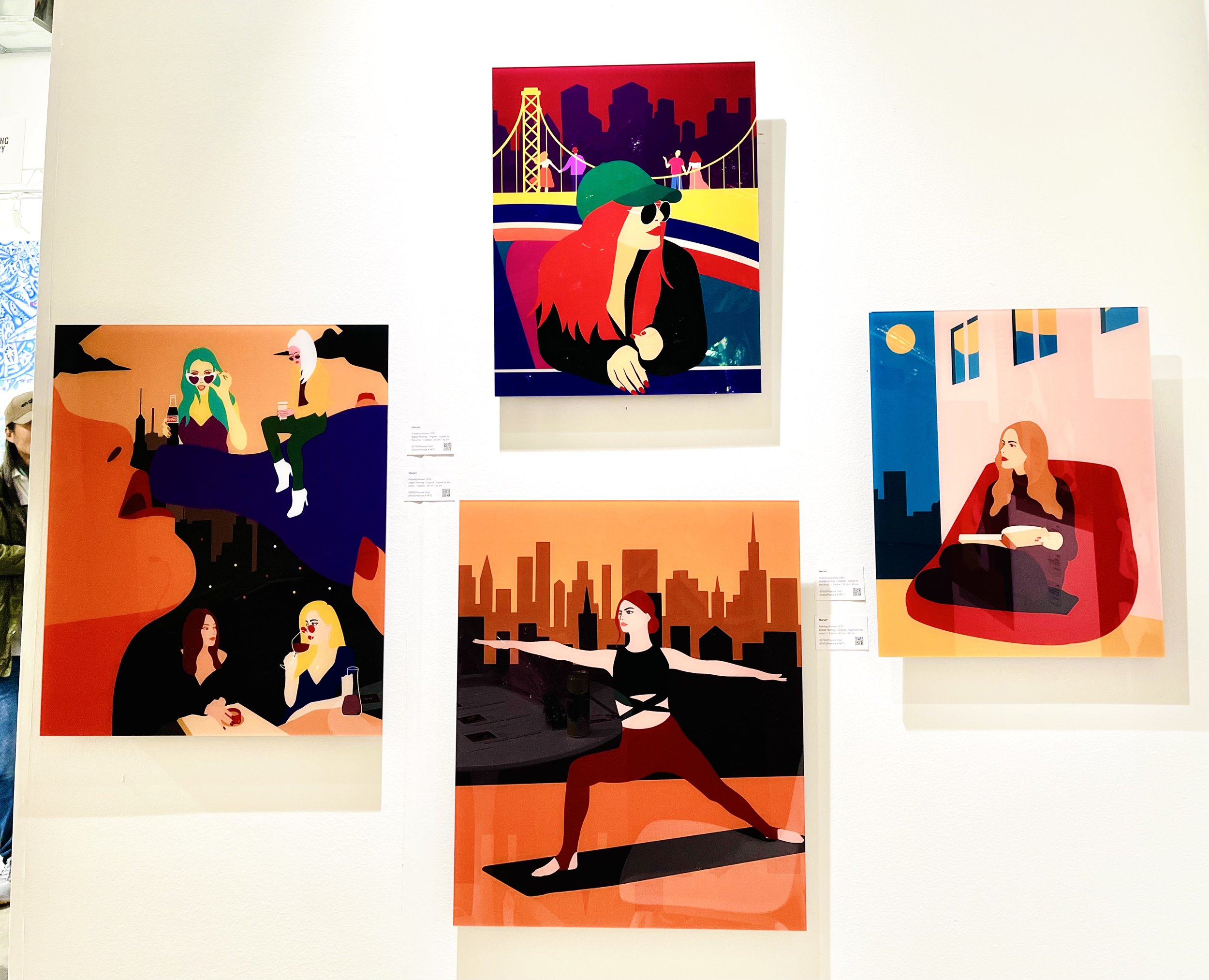 Colorful modern art gallery display with illustrations of women in various settings, including urban and natural scenes, and performing activities like yoga.