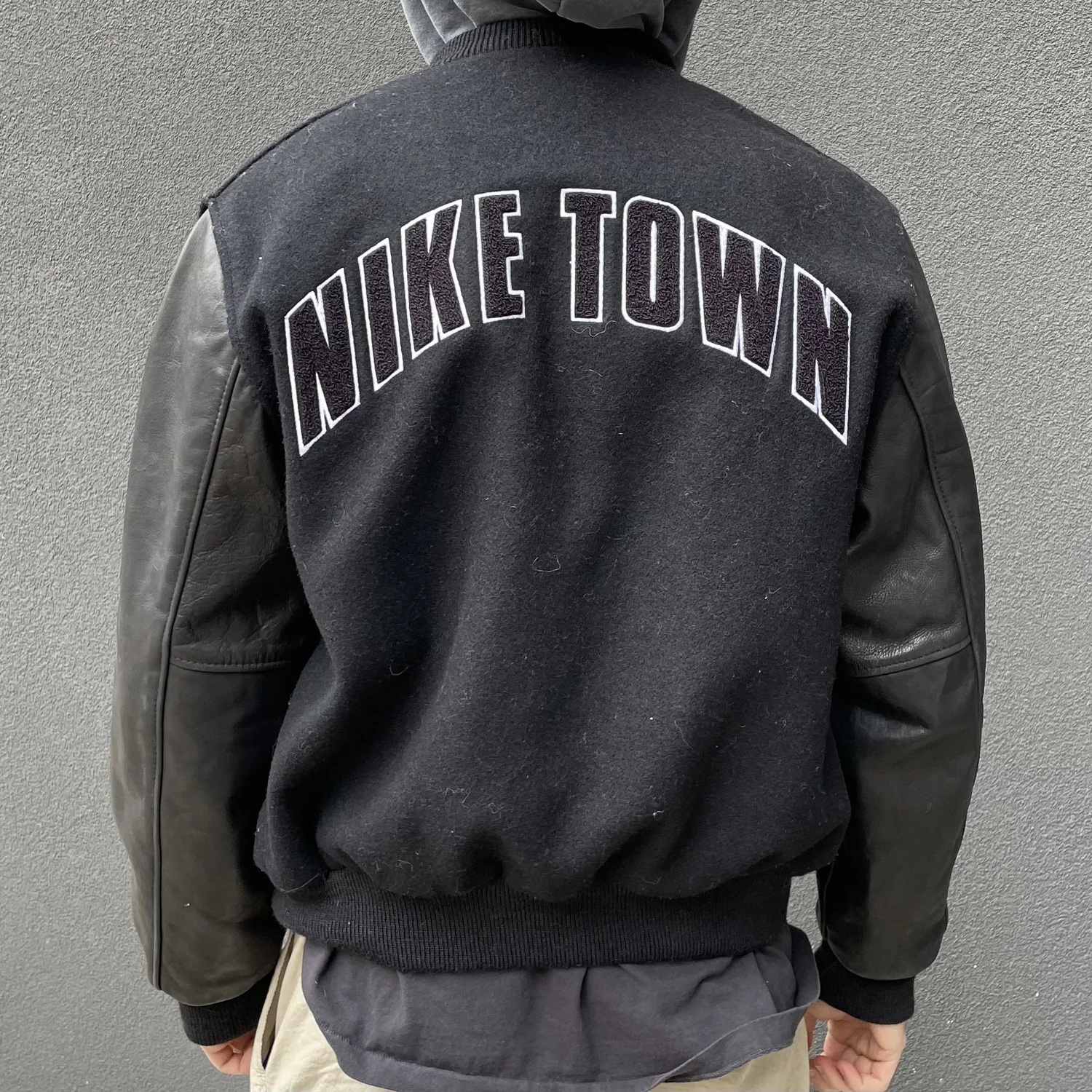 90s niketown varsity jacket — muñeca vintage