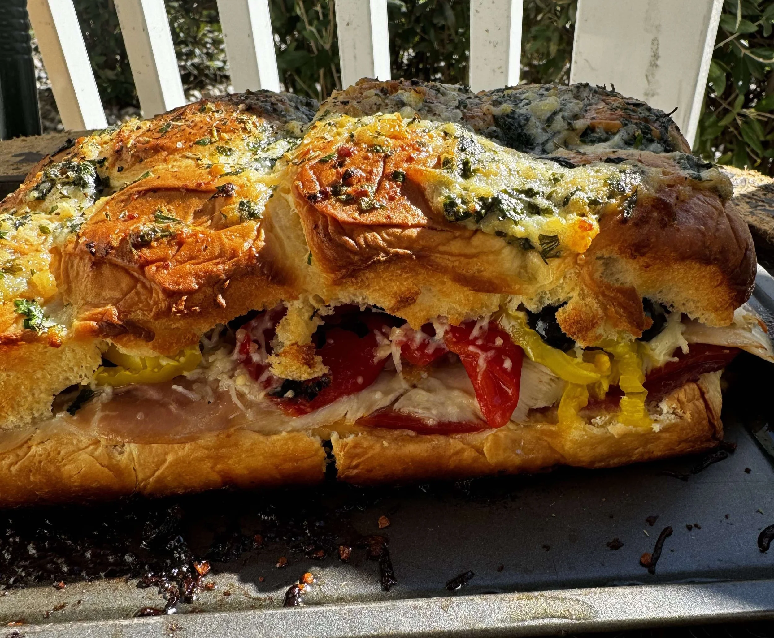 These cheesy Italian sandwiches are perfect to feed a crowd! Mortadella, pepperoni, prosciutto, Salami, mozzarella, banana peppers, Olives, and roasted red peppers are loaded on mini Brioche buns