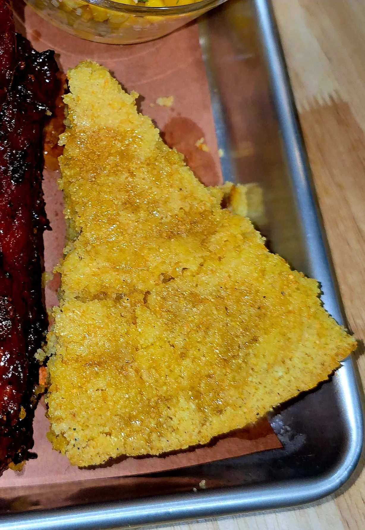 Made from scratch Cornbread, made the old fashioned way in a cast iron skillet made with cornmeal and buttermilk