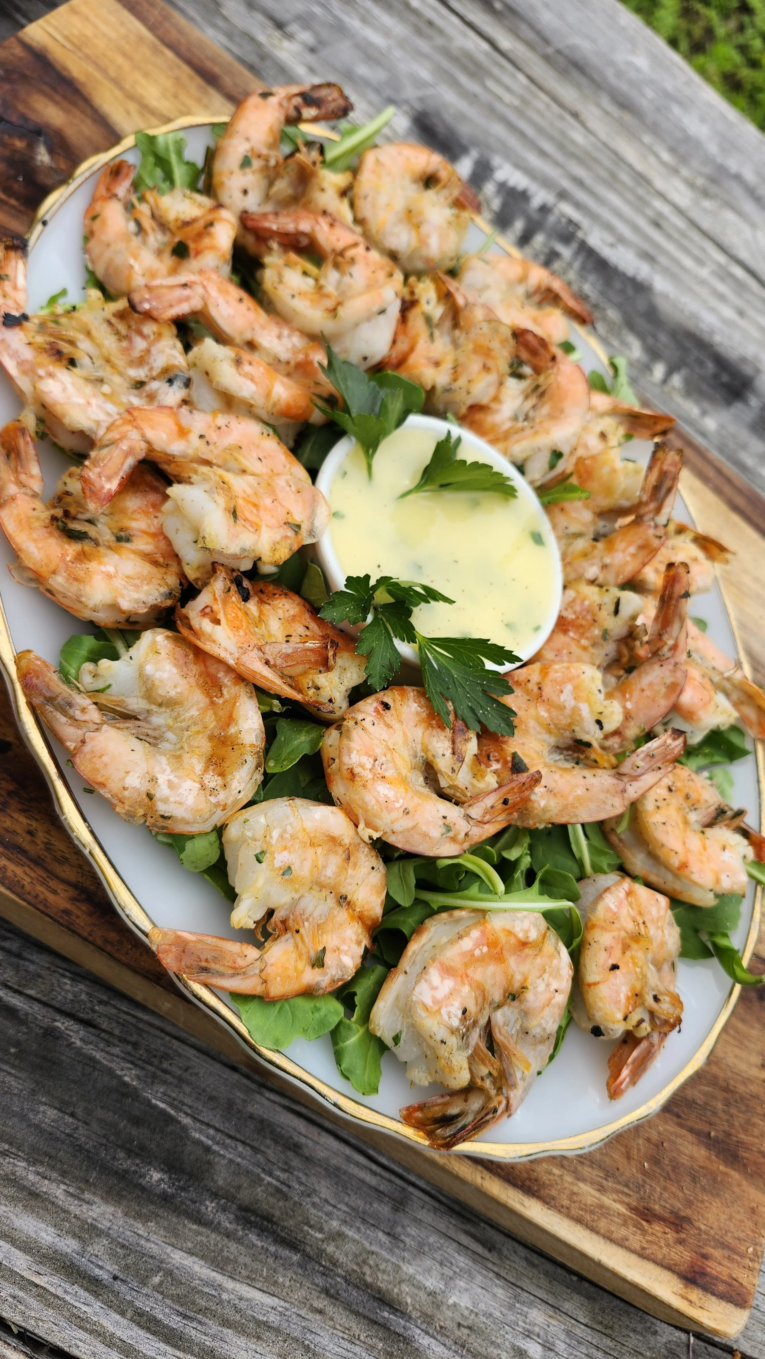 The classic Shrimp Scampi gets even better on the grill! Jumbo shrimp is marinated in olive oil, garlic, and wine, then grilled and served with a creamy scampi butter sauce