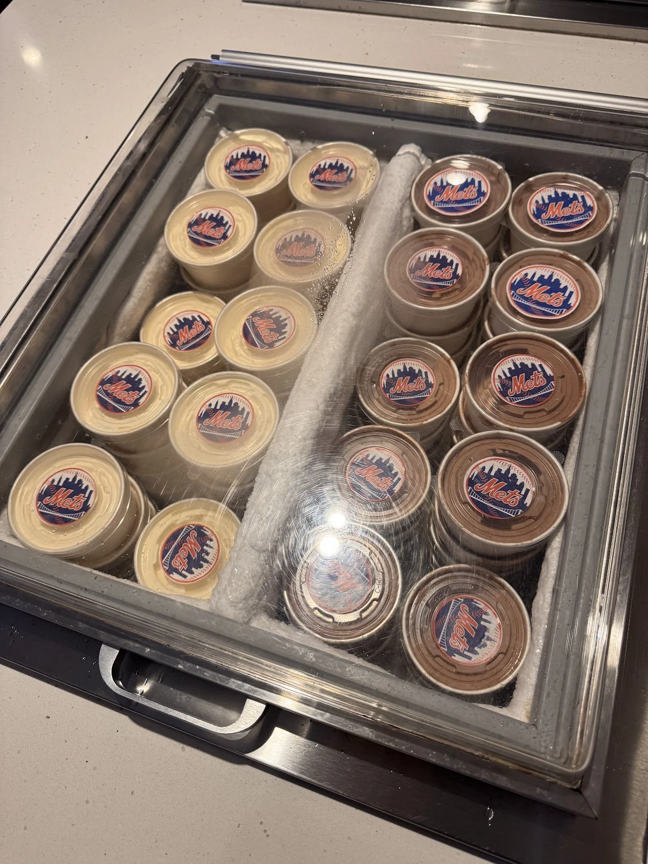 Mets-branded vanilla and chocolate ice cream cups in the Delta Sky360 Club