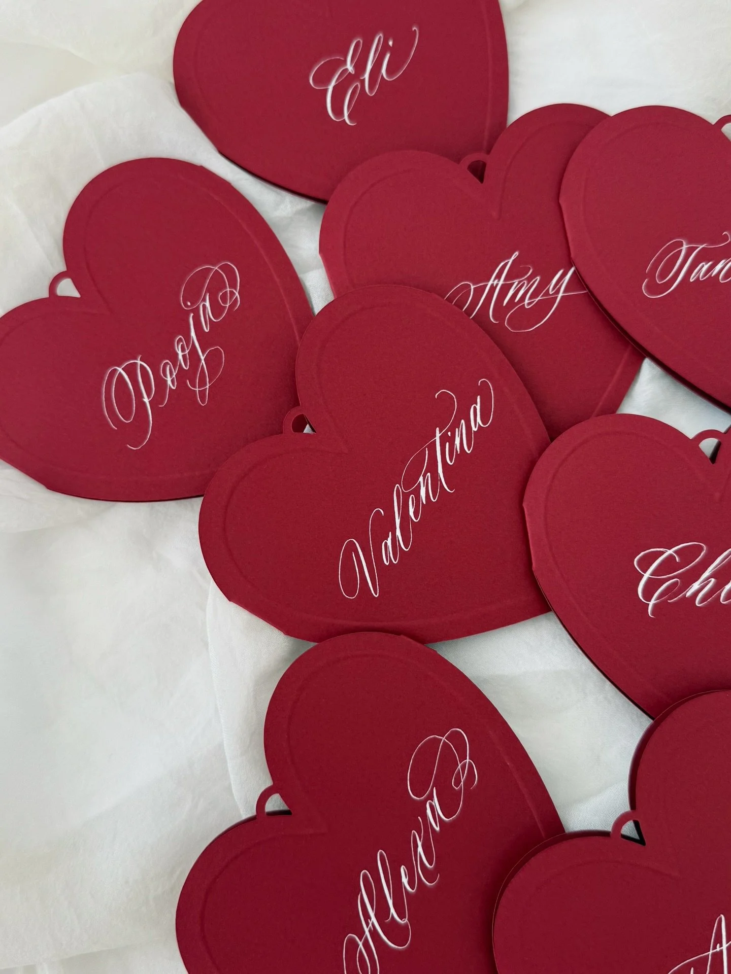 Little Red Heart Lockets for @wormholesg &hearts;️ Names full of swirl &amp; whimsy

#paperlocket #redheart #paperstationery #eventstyling #calligraphyflourish #moderncalligraphy