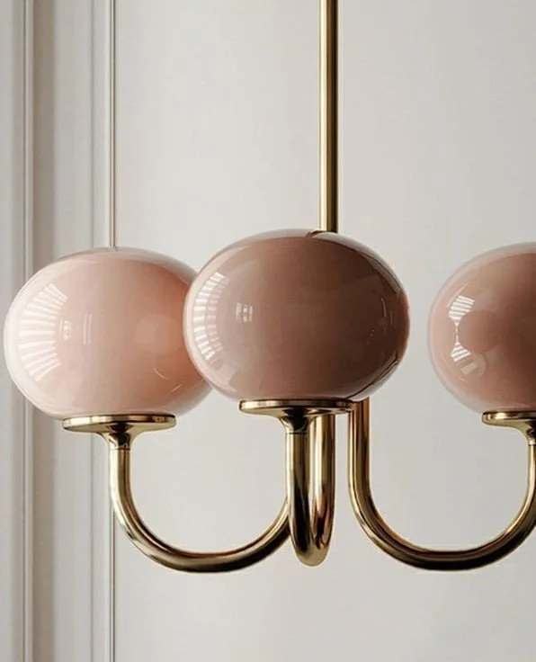 There&rsquo;s something special about finding a piece that feels exactly like our clients, refined, a little unexpected, and full of personality.⁠
⁠
This blush-toned glass pendant with warm brass detailing is the perfect example. Sculptural, elegant,
