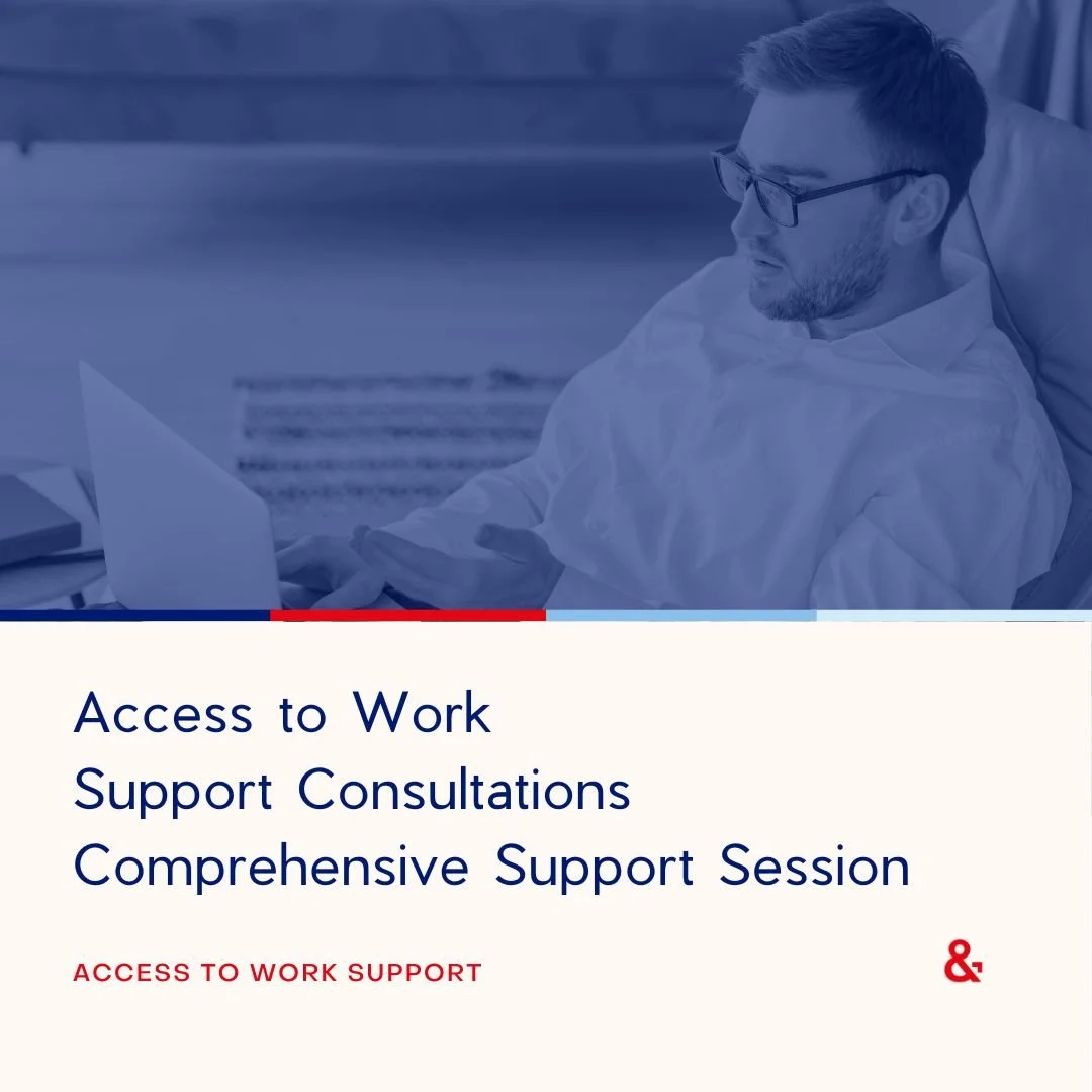 A man sat on a sofa looking at his laptop